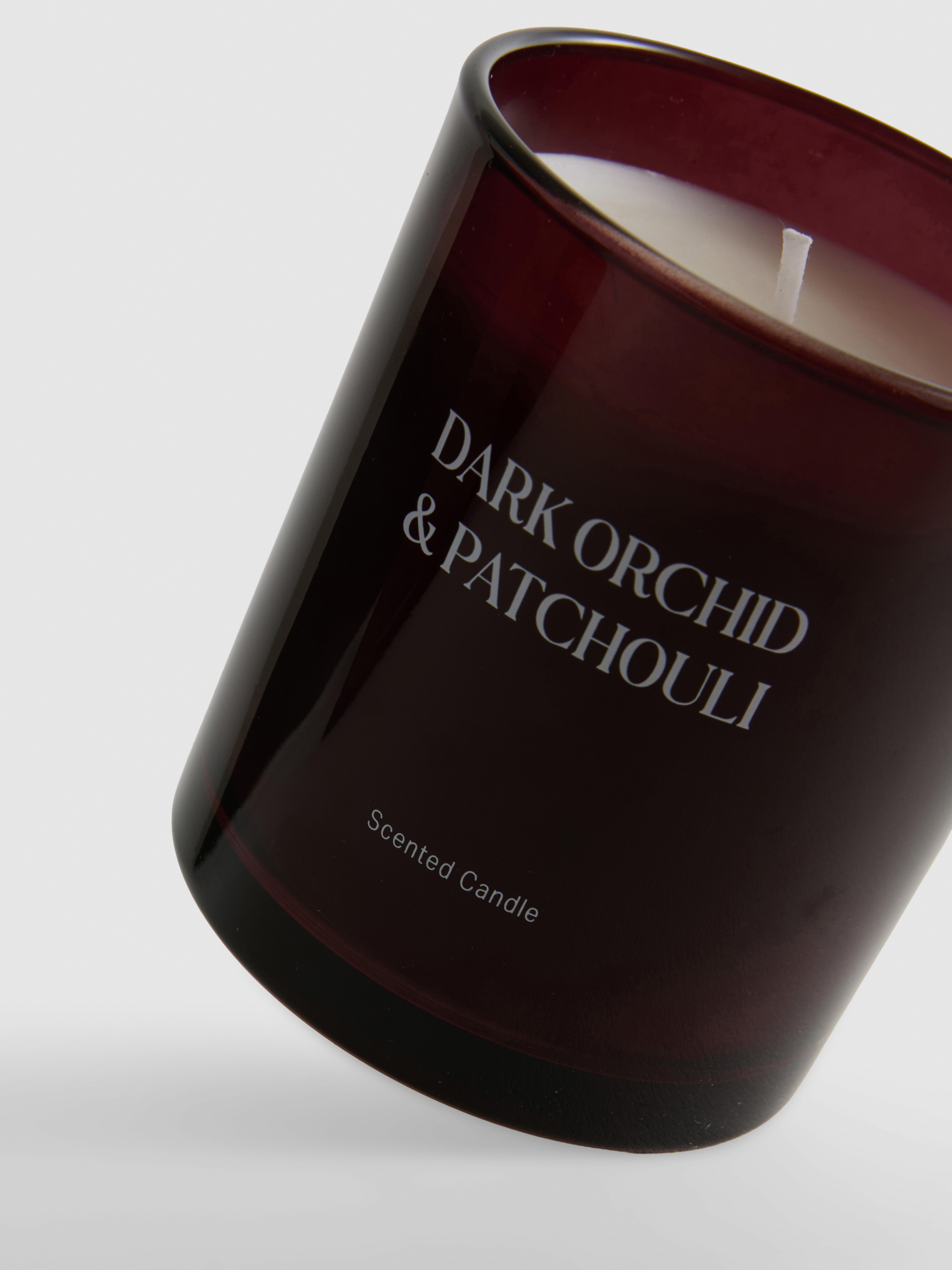 Bougie parfumée dans un pot en verre