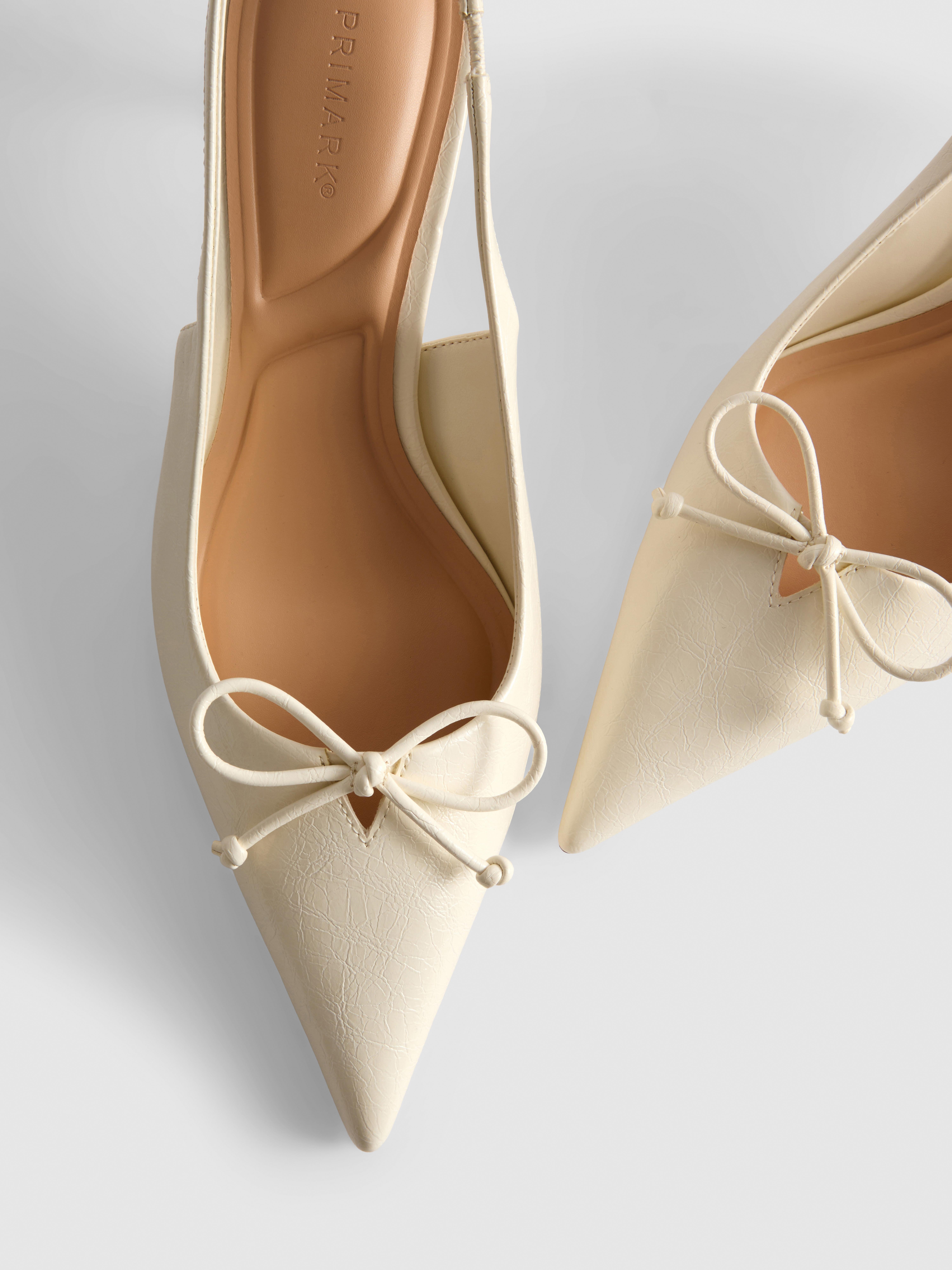 Slingback-Pumps mit Zierschleife