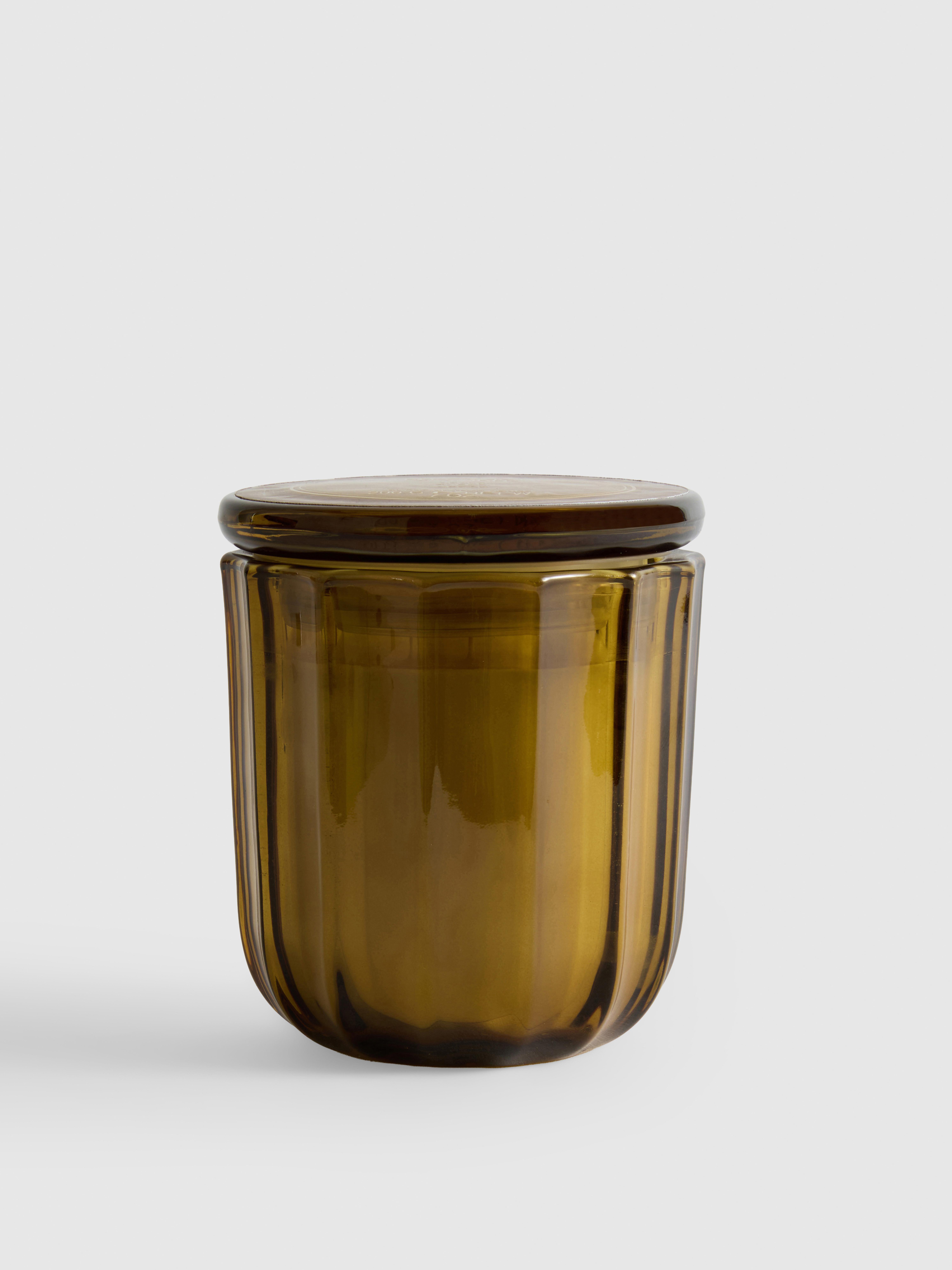 Vela aromática en tarro de vidrio