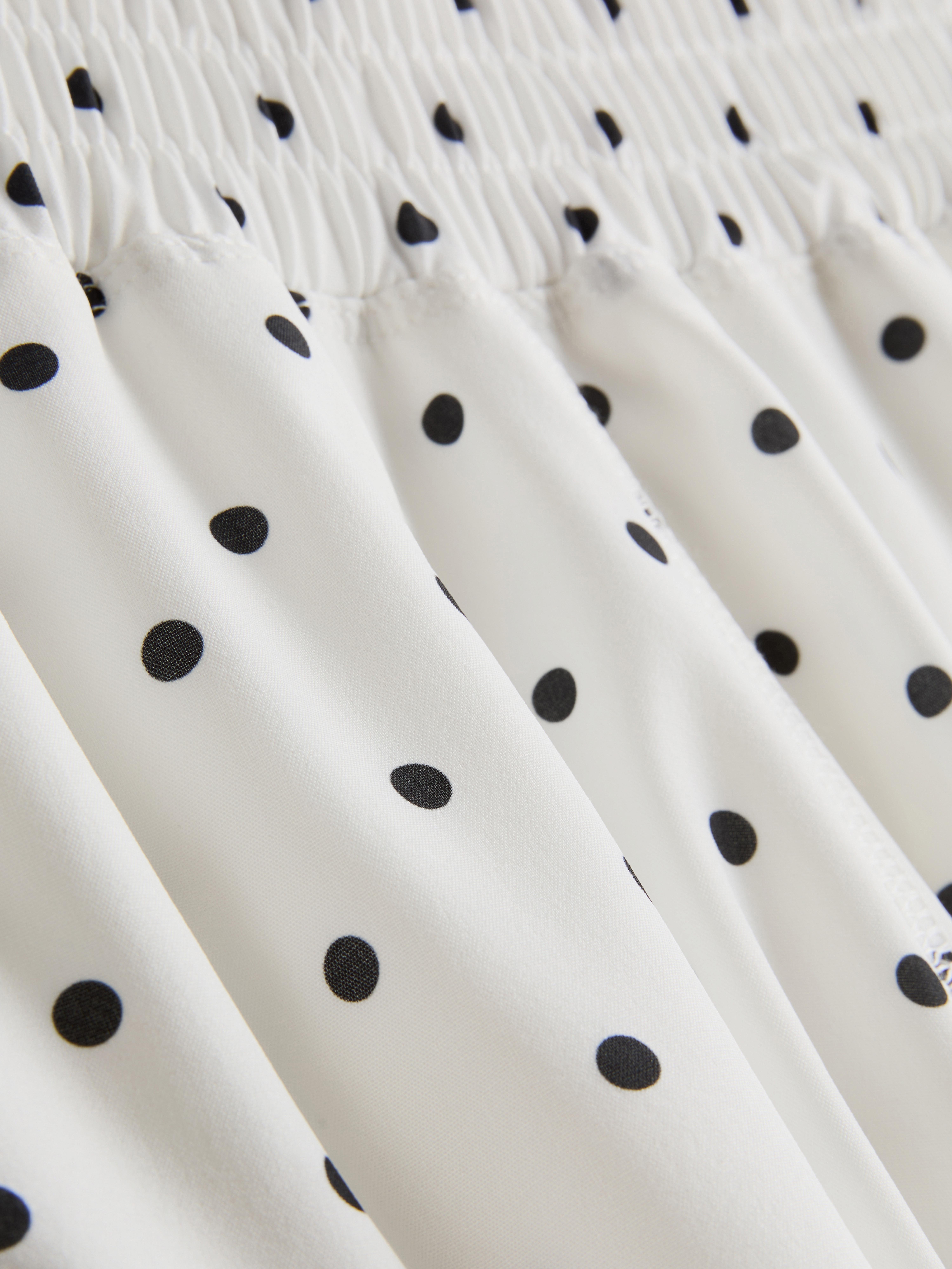 Pantaloncini da running intessuti a pois
