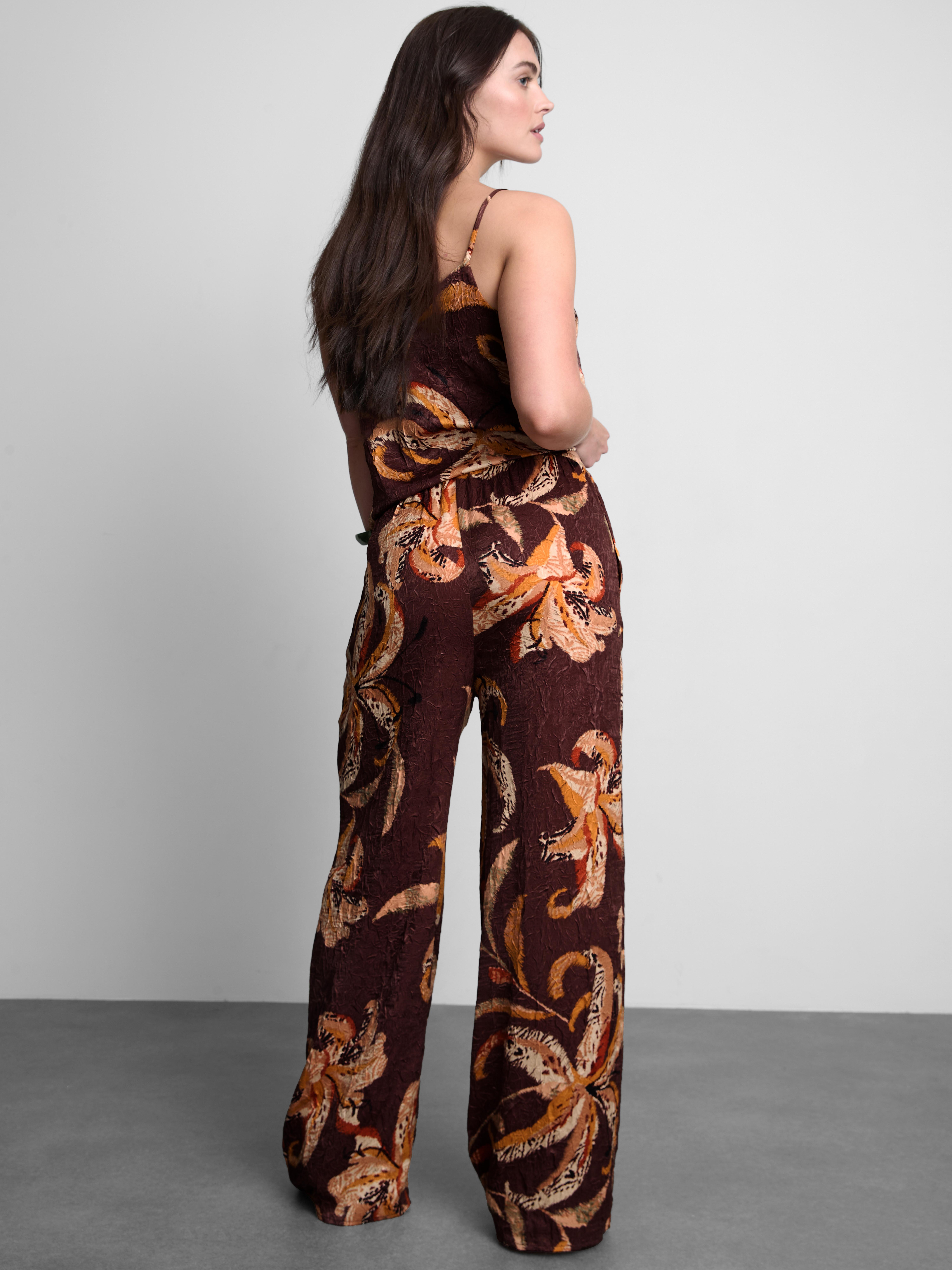 Pantalon large en satin froissé à motif floral
