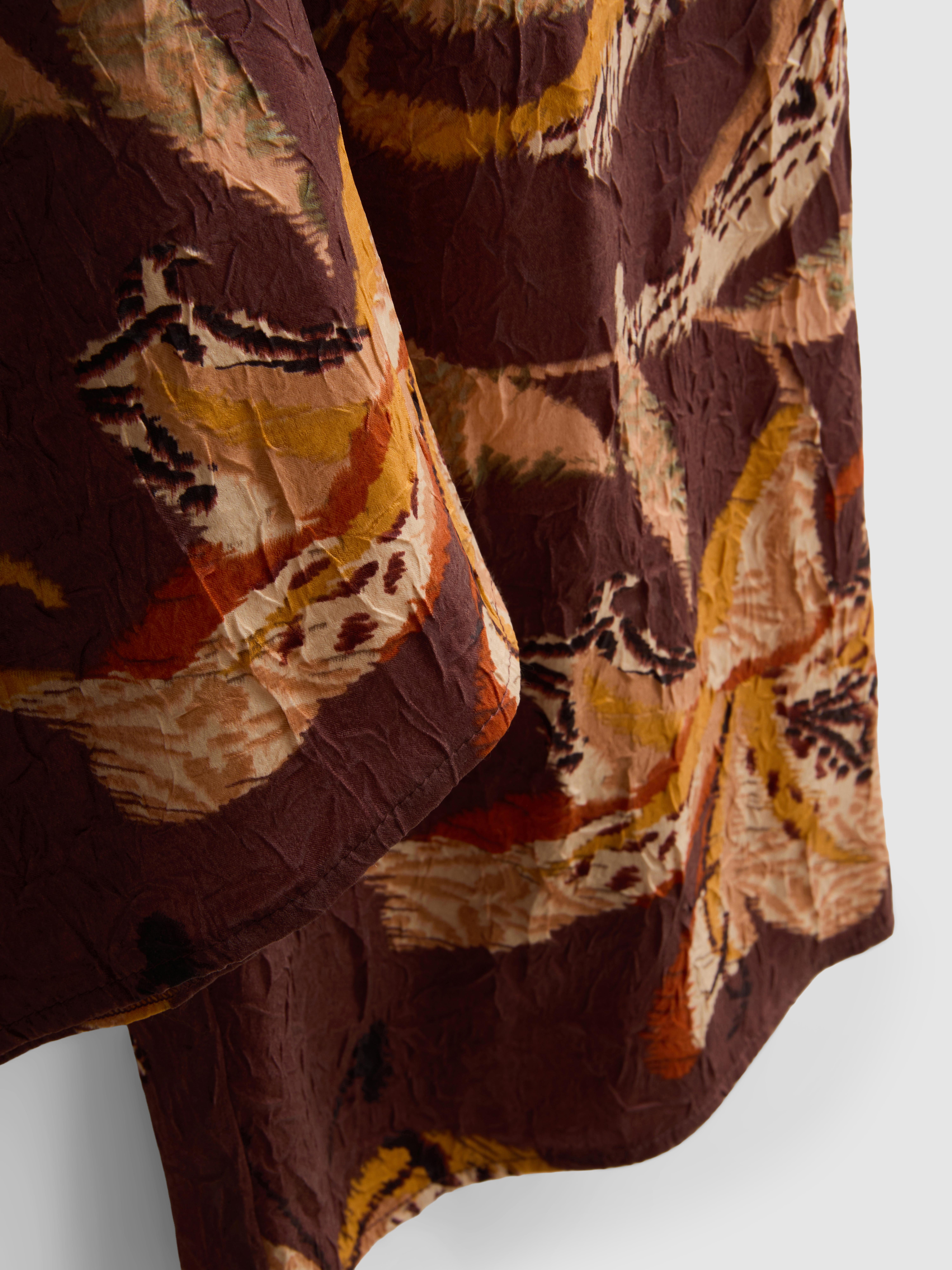 Pantalon large en satin froissé à motif floral