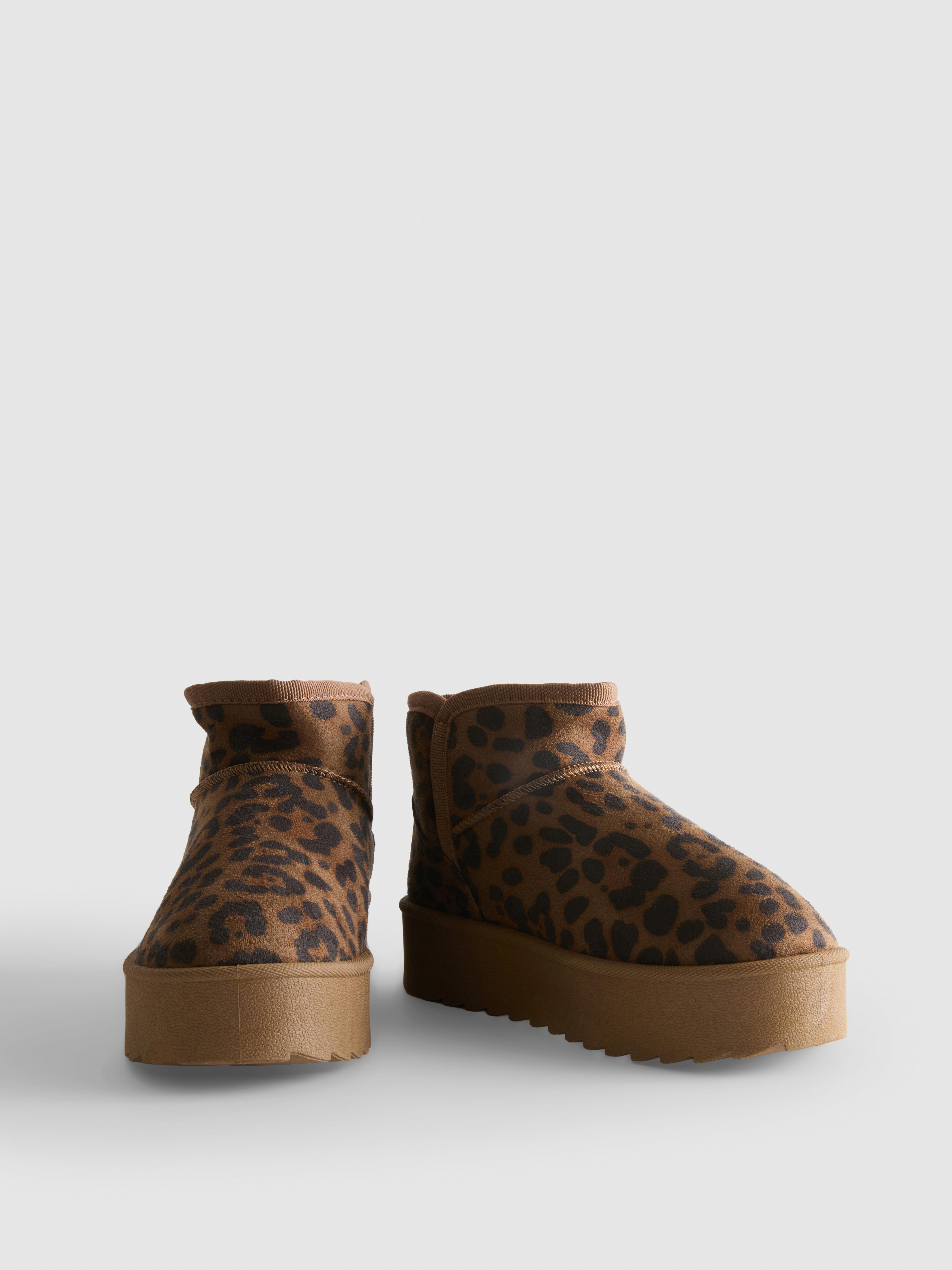 Botines ajustados de leopardo con plataforma