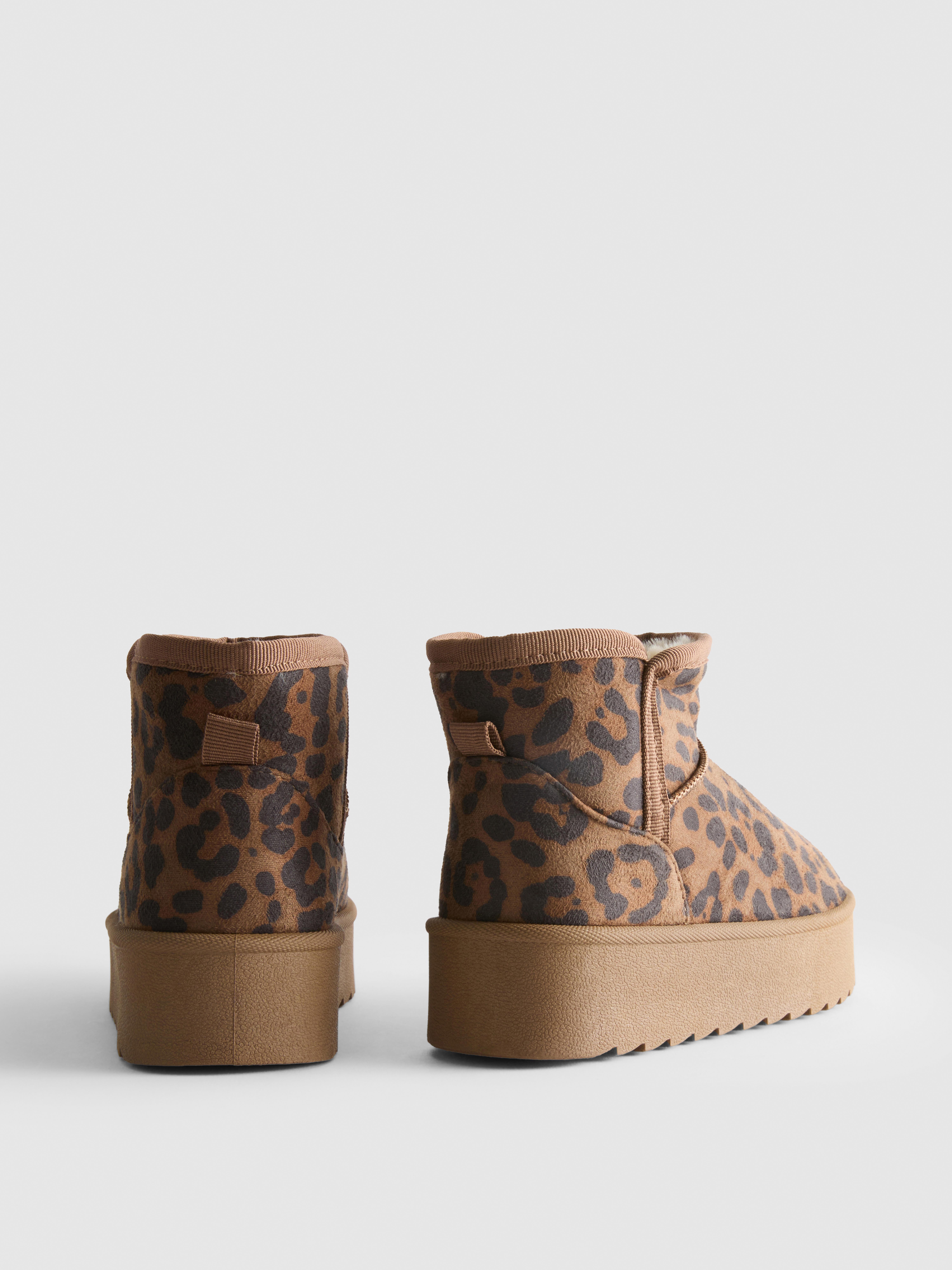 Botines ajustados de leopardo con plataforma