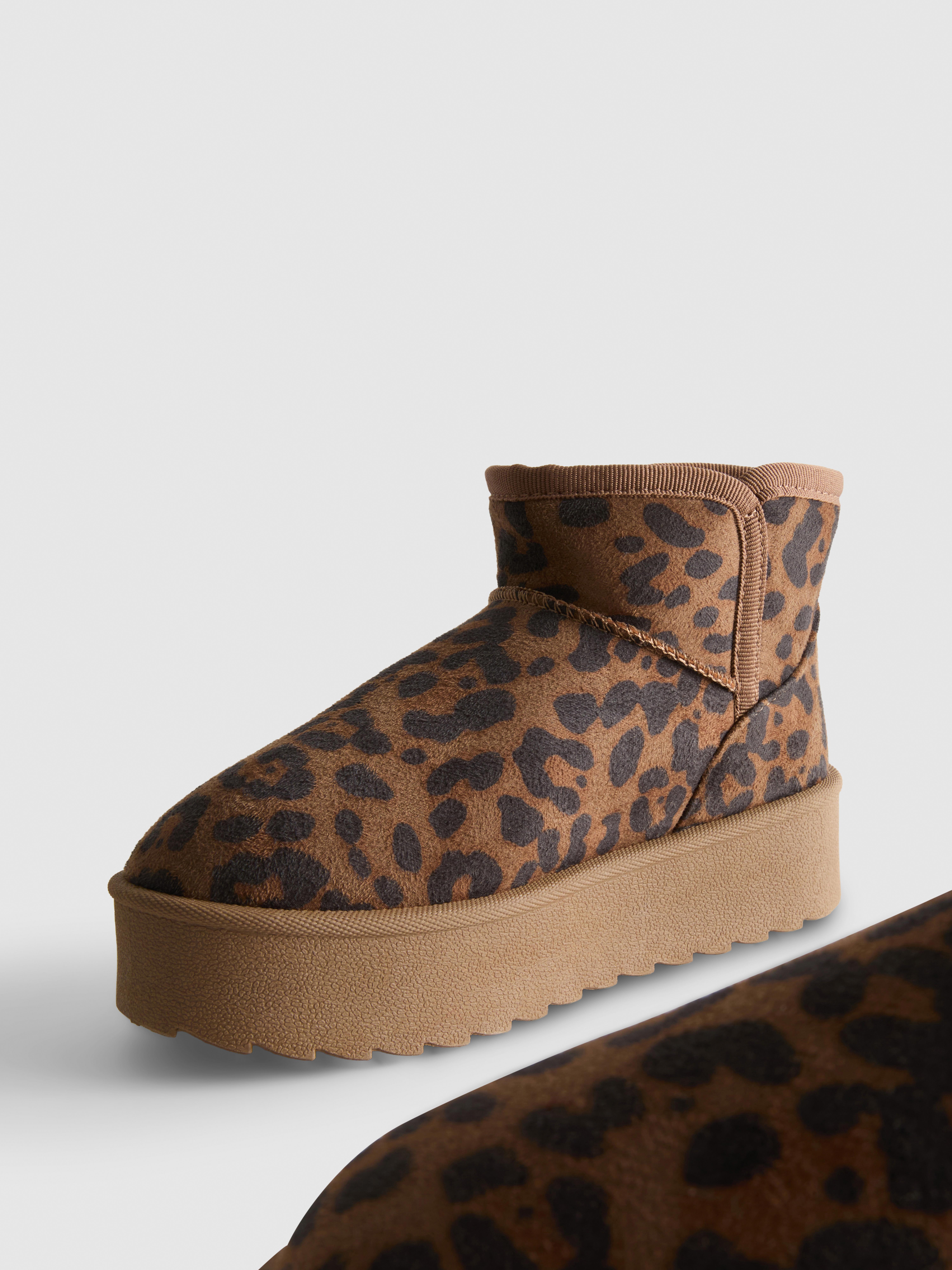 Botines ajustados de leopardo con plataforma