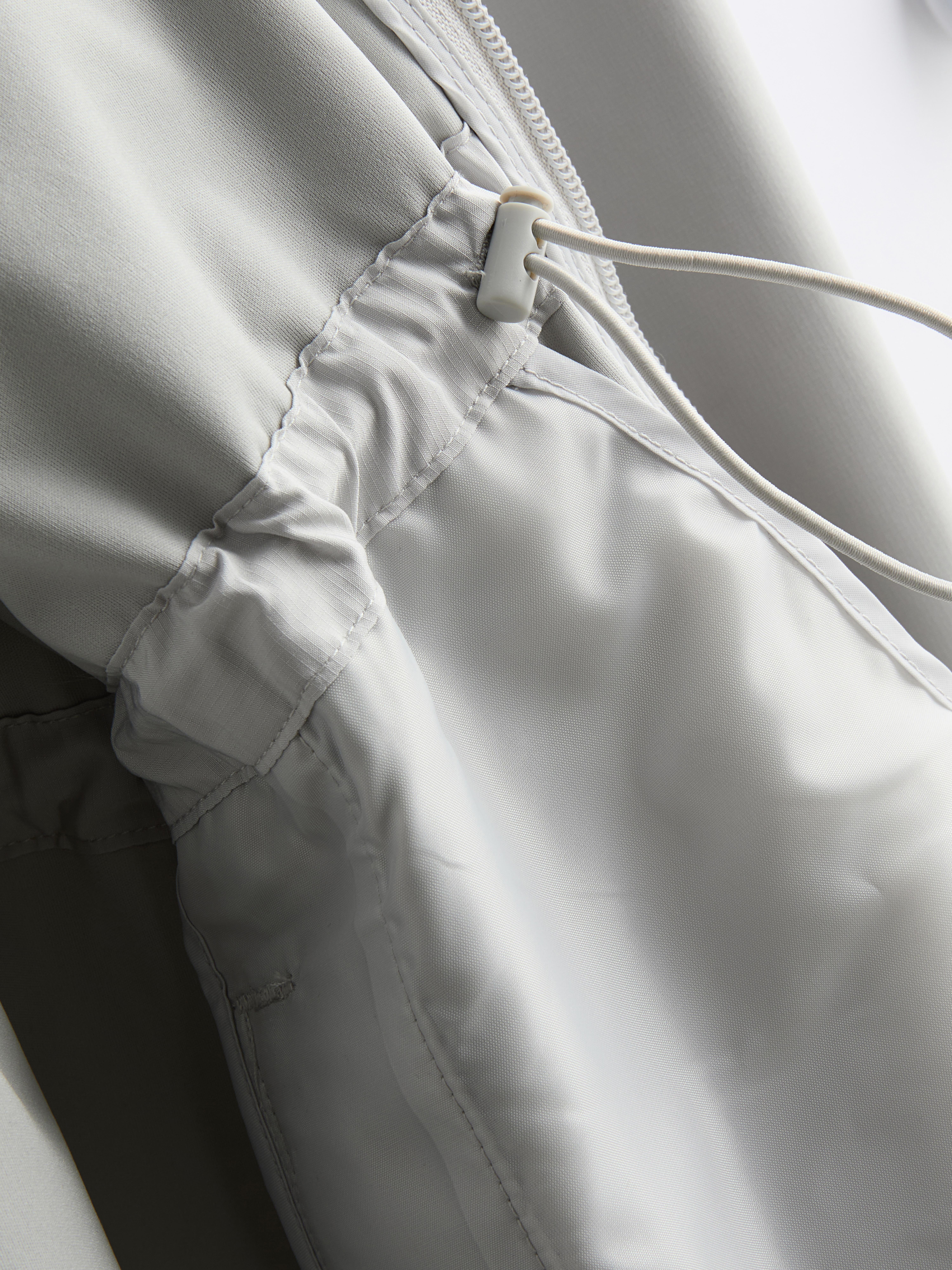 Cinch Detail Longline Raincoat