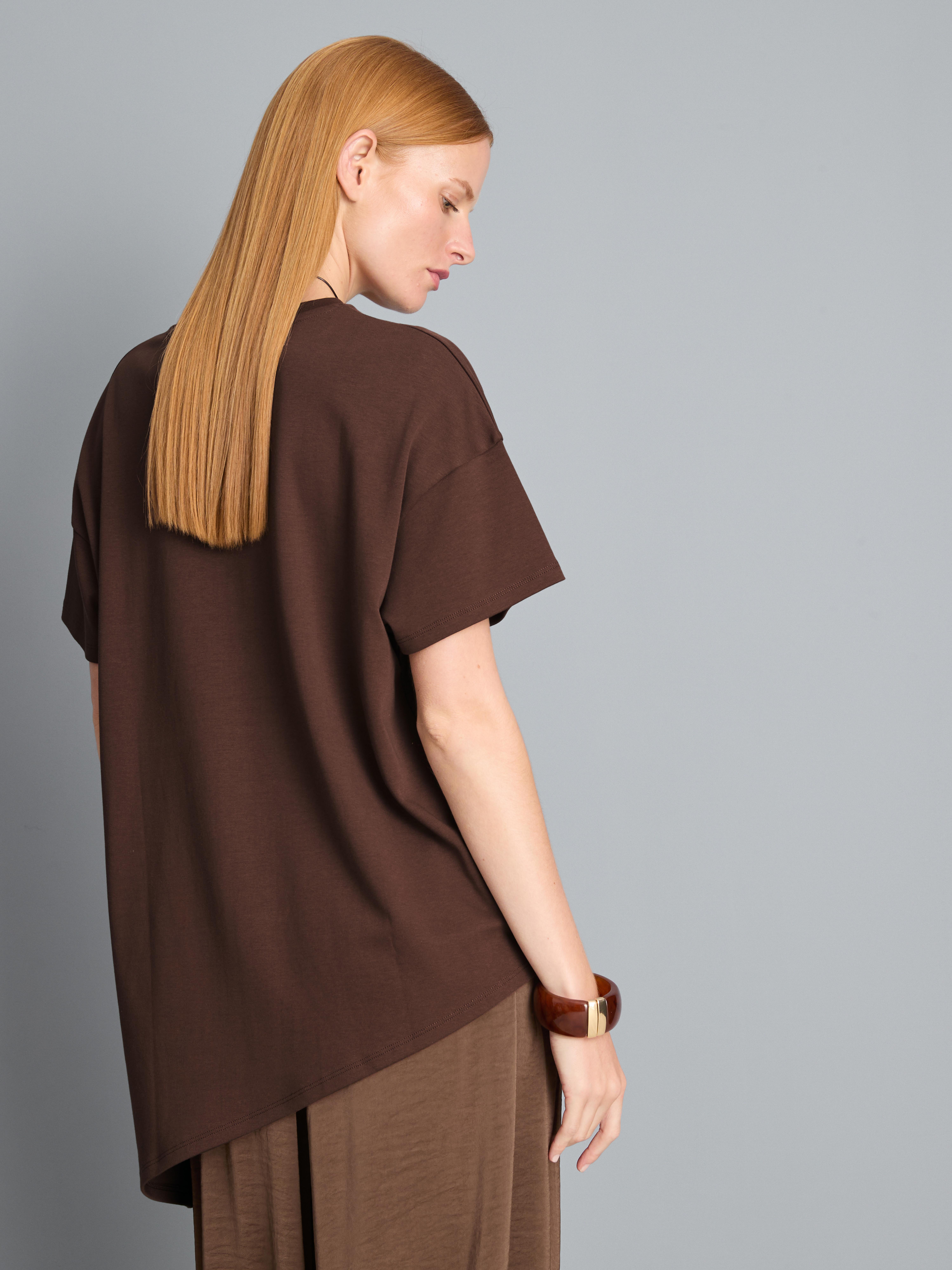 Lang asymmetrisch katoenen T-shirt