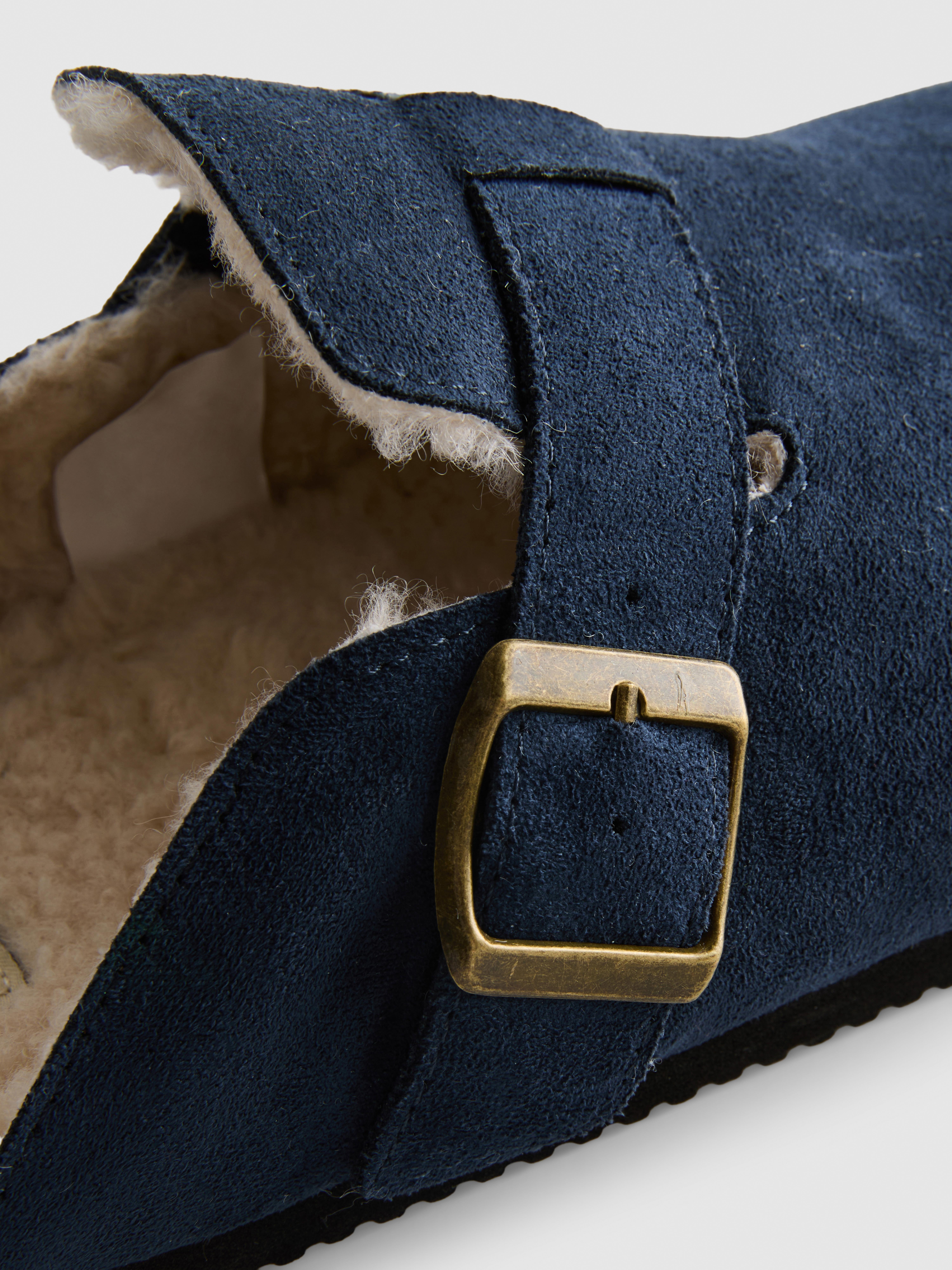 Mules doublées en fausse fourrure
