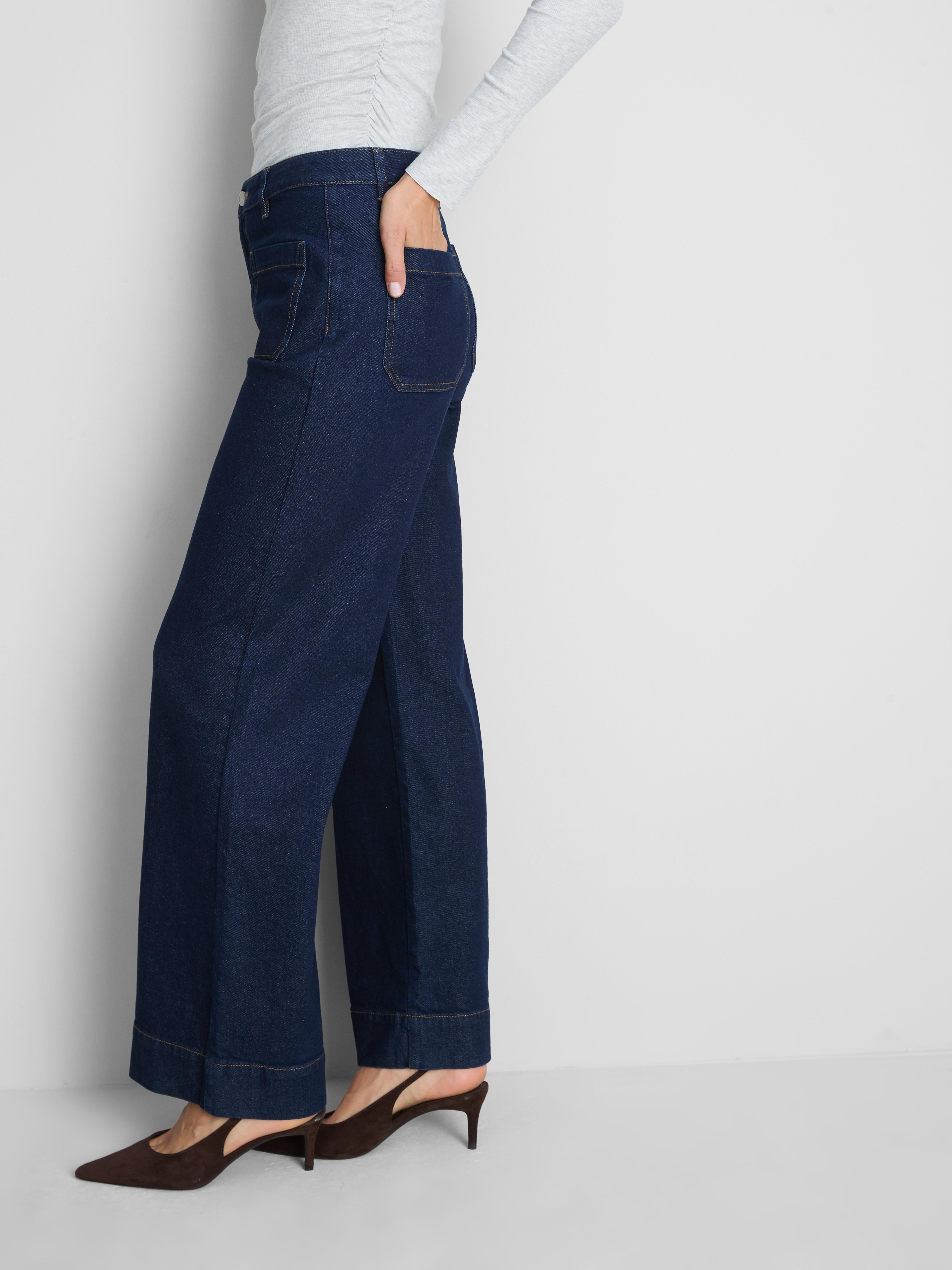 Jeans larghi con tasche applicate