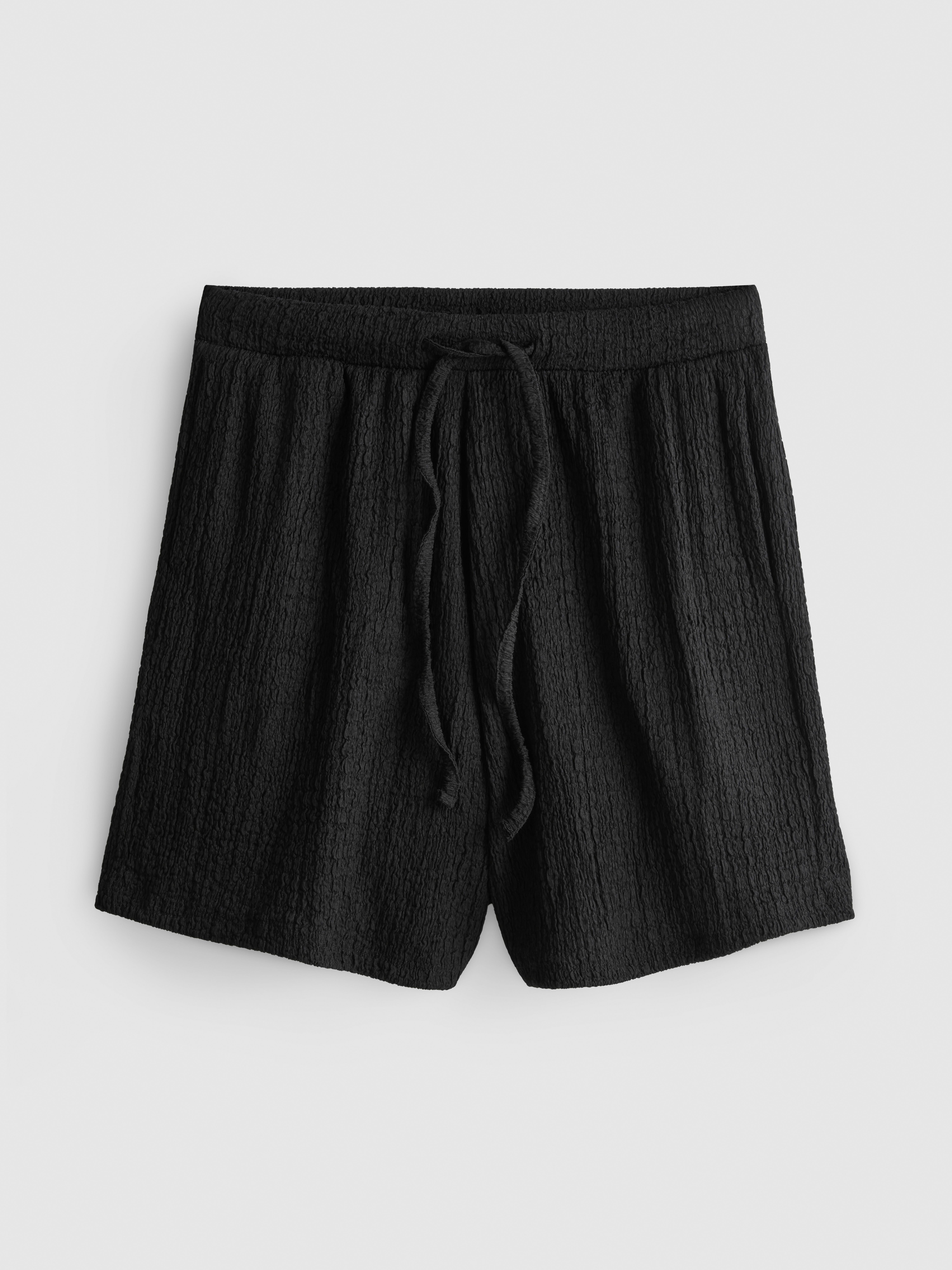 Relaxte short met textuur