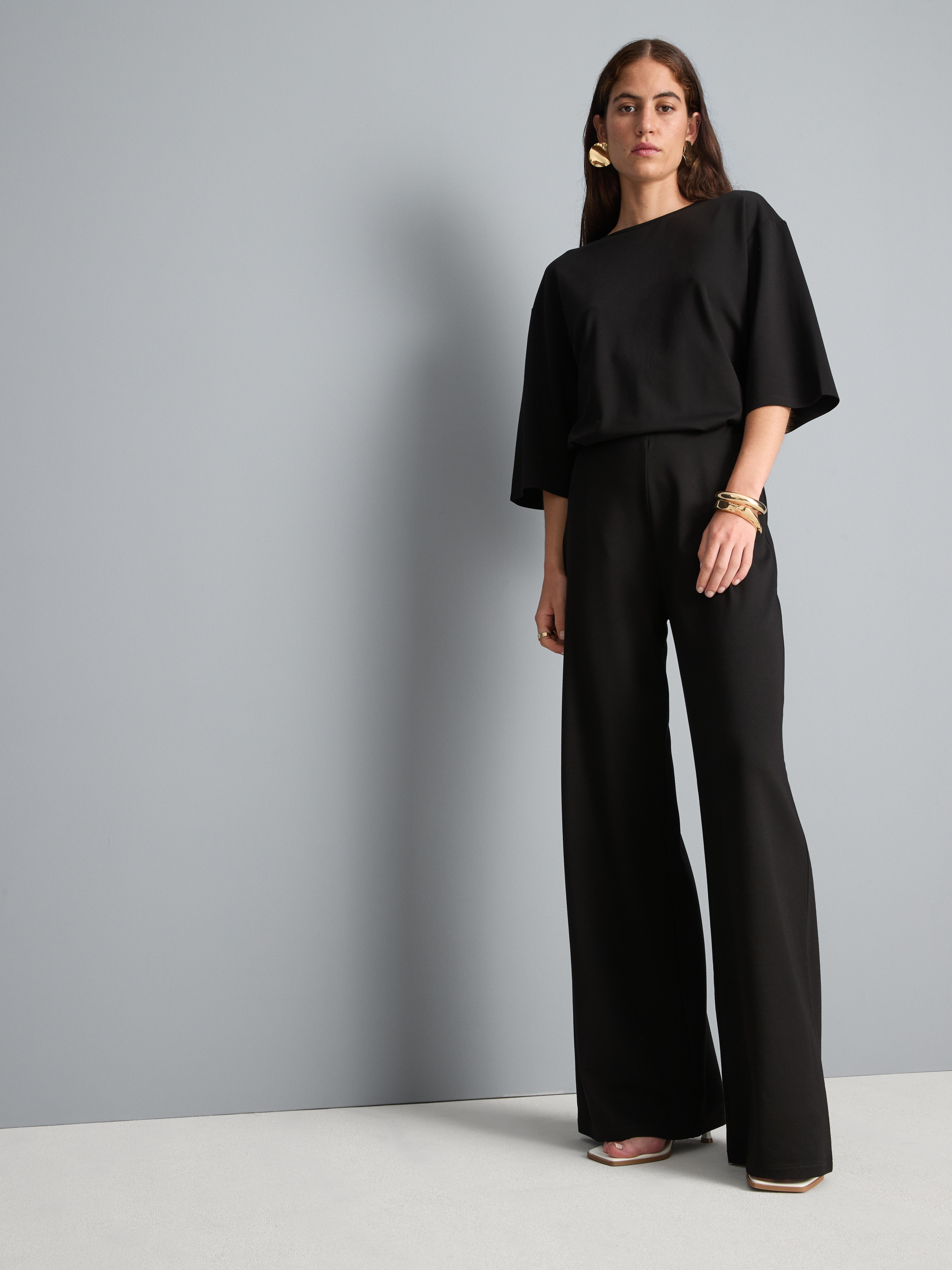 Pantalones de punto plisados de pernera ancha