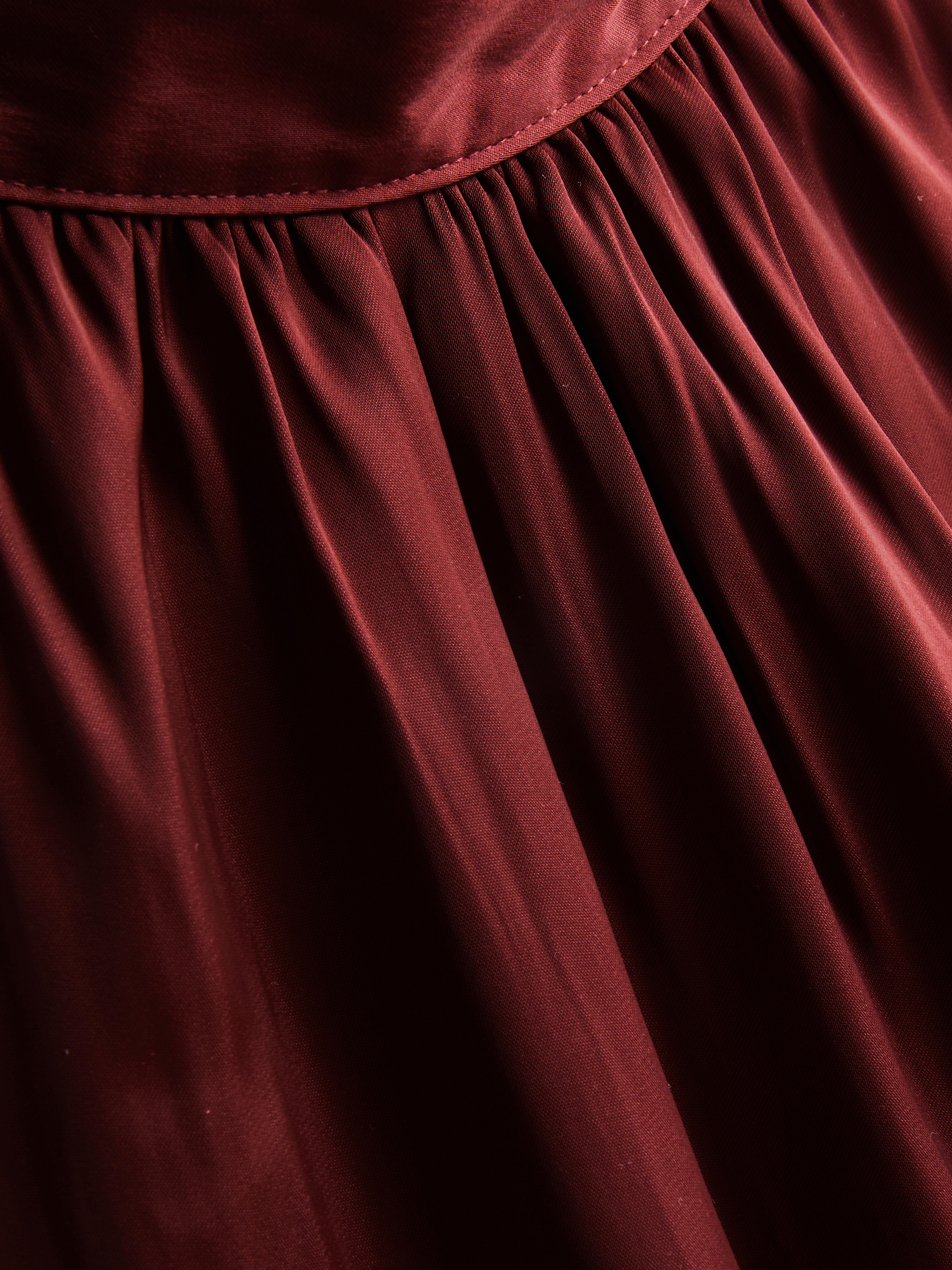 Blouse met halternek en ballonzoom