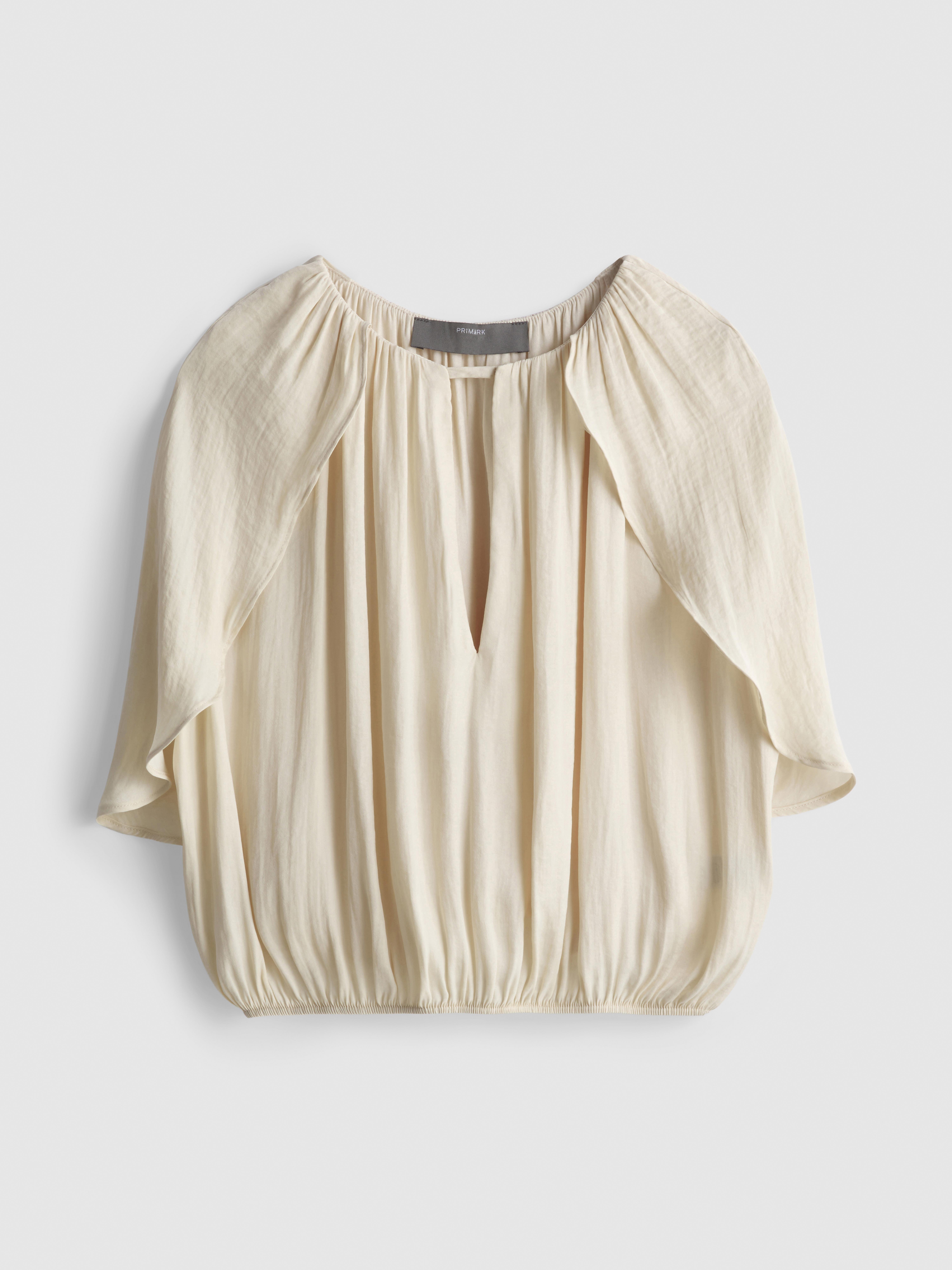 Blusa curta capa drapeada