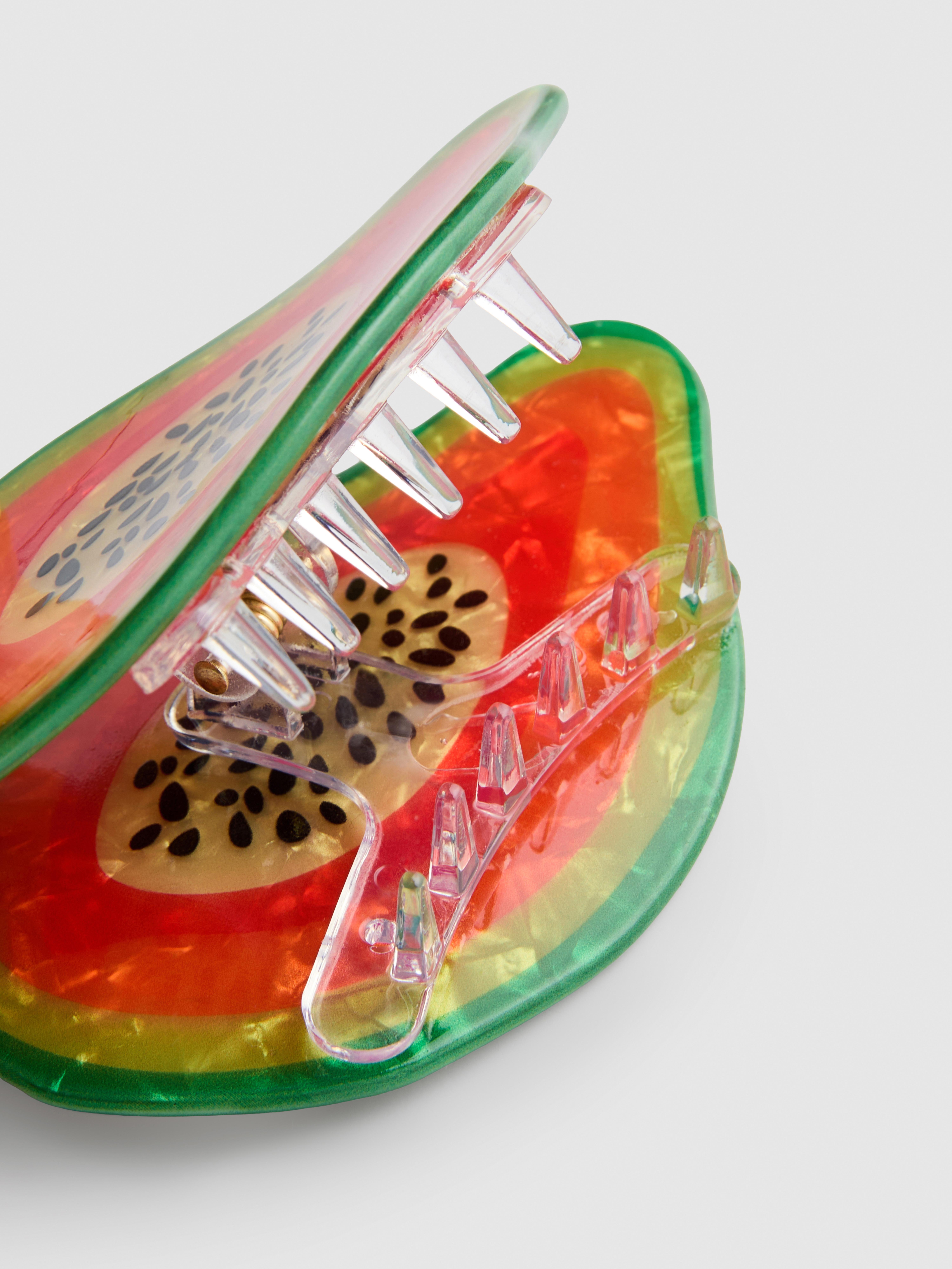 Fermacapelli a forma di papaya