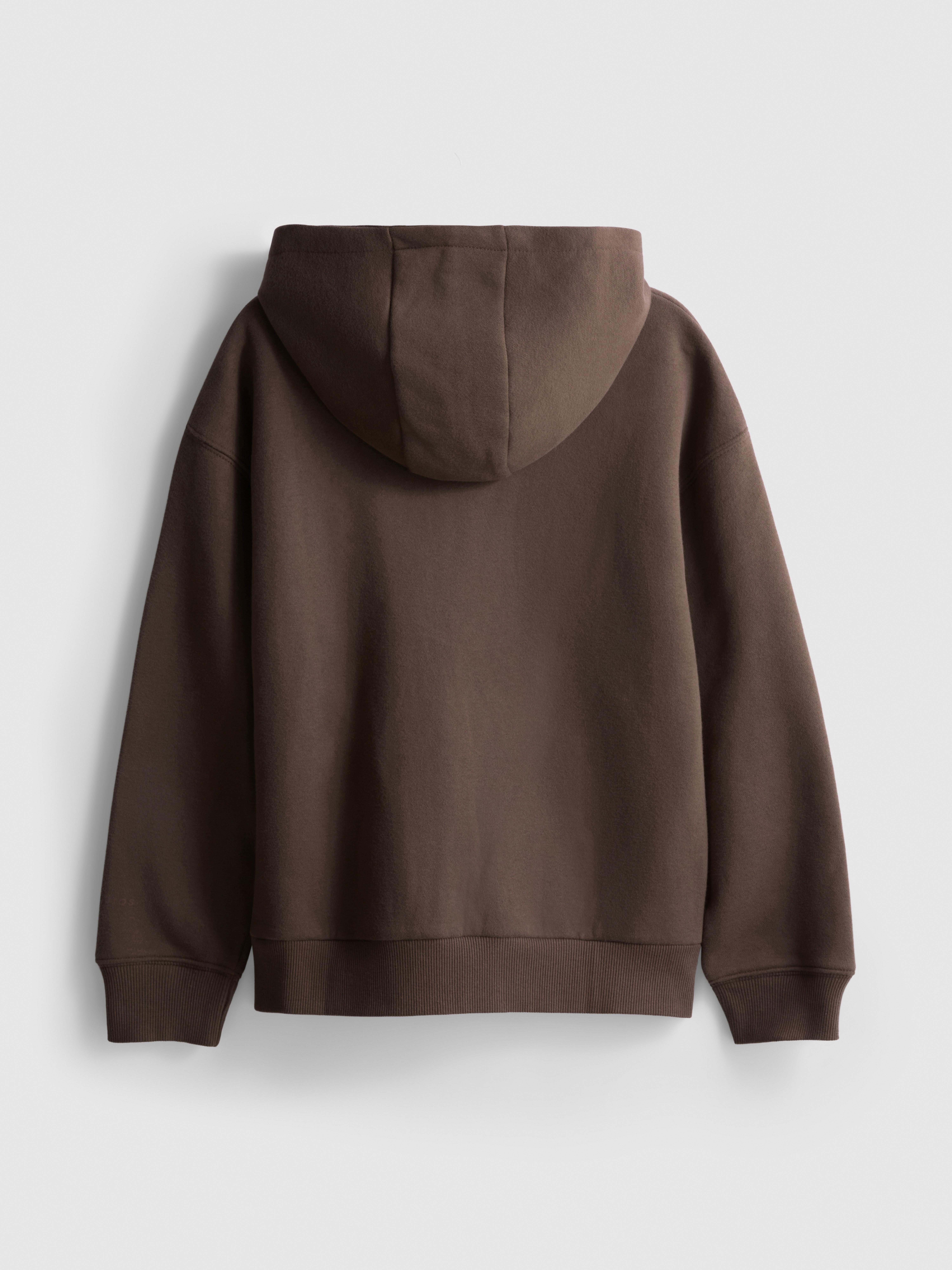 7–15 ans | Sweat à capuche en coton majoritaire