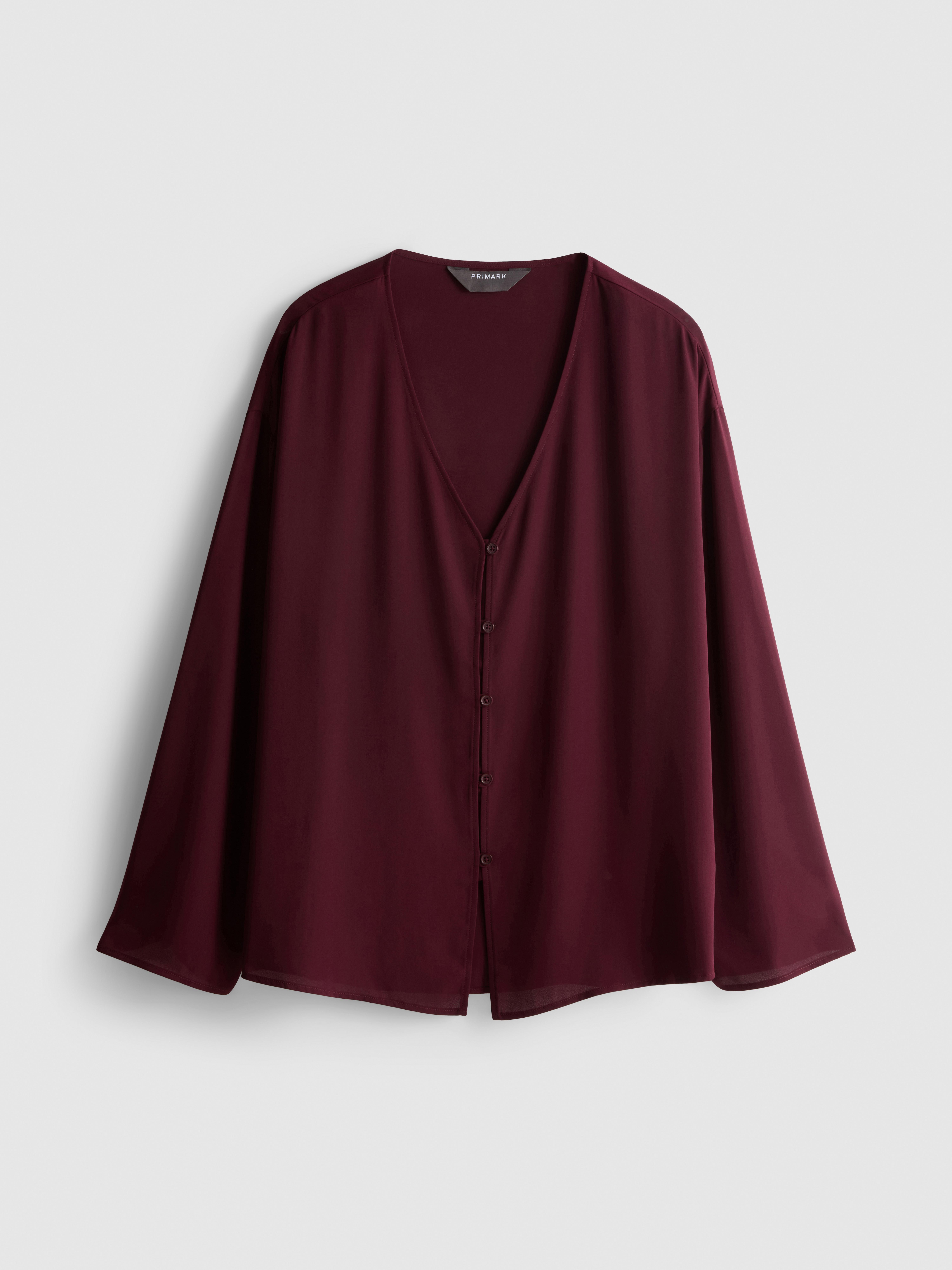 Blusa de crepé con cuello de pico