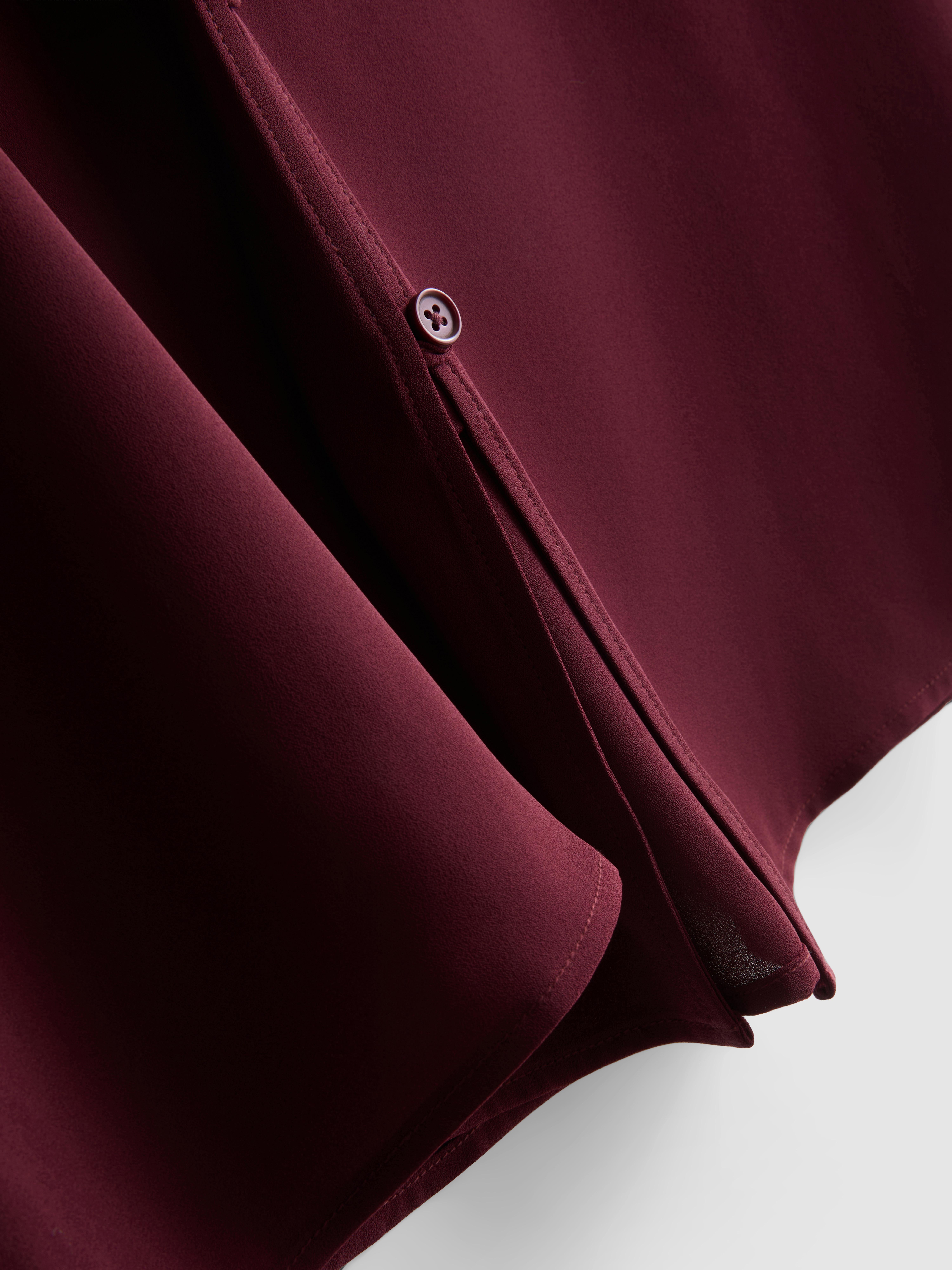 Blusa de crepé con cuello de pico
