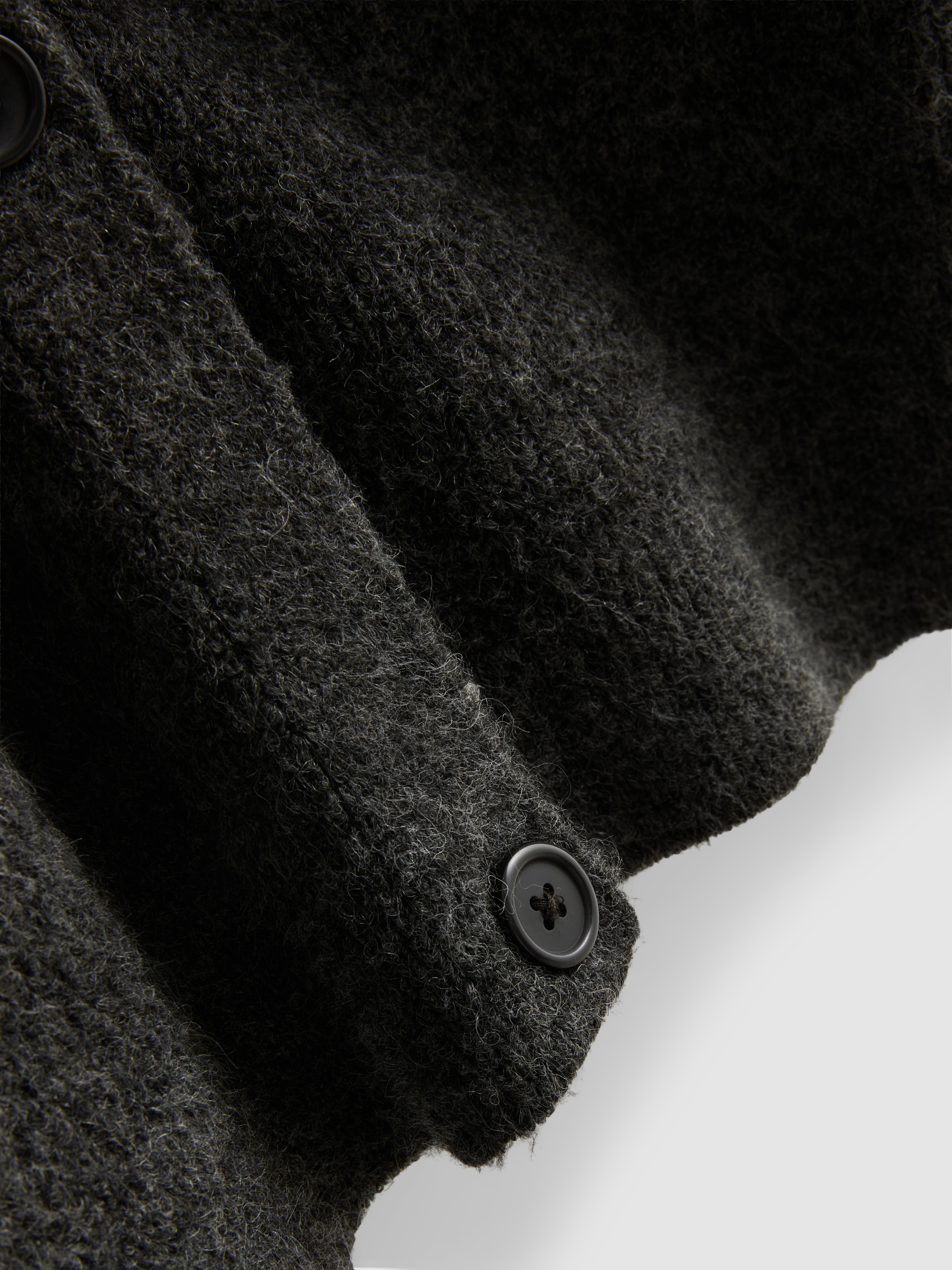 Zacht geribd vest met V-hals