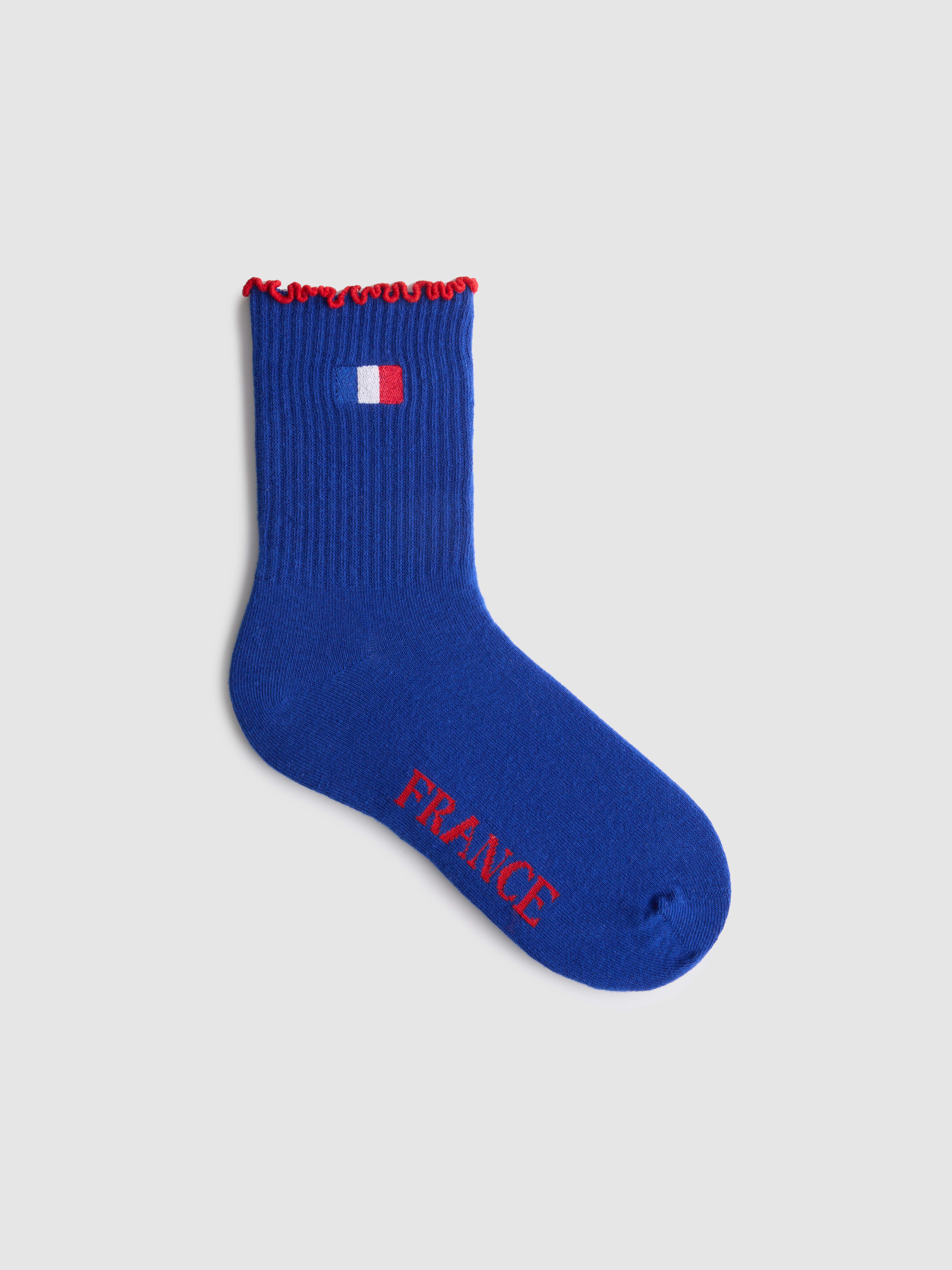 1 paire de chaussettes côtelées à motif pays