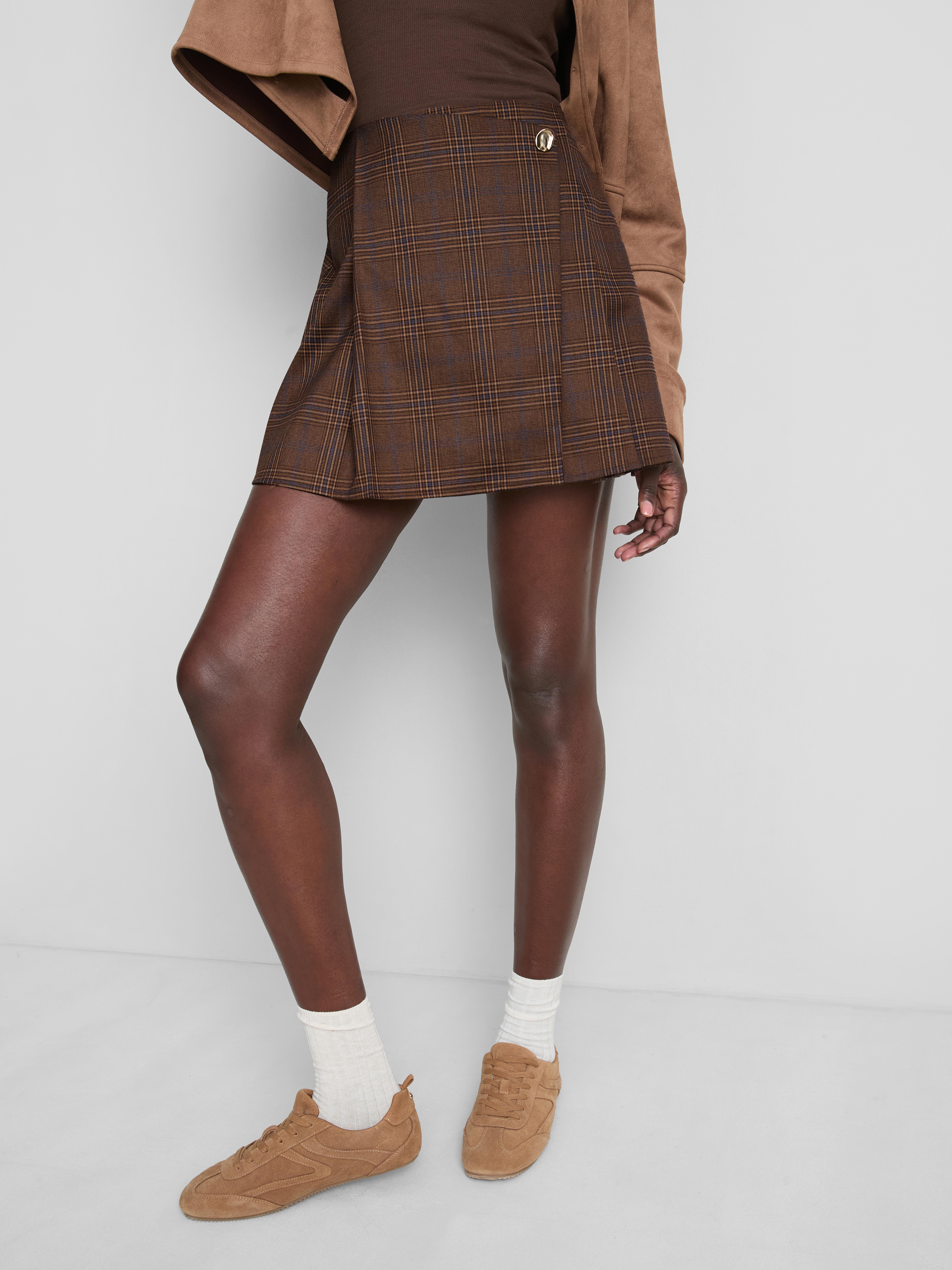 Mini-jupe asymétrique ajustée