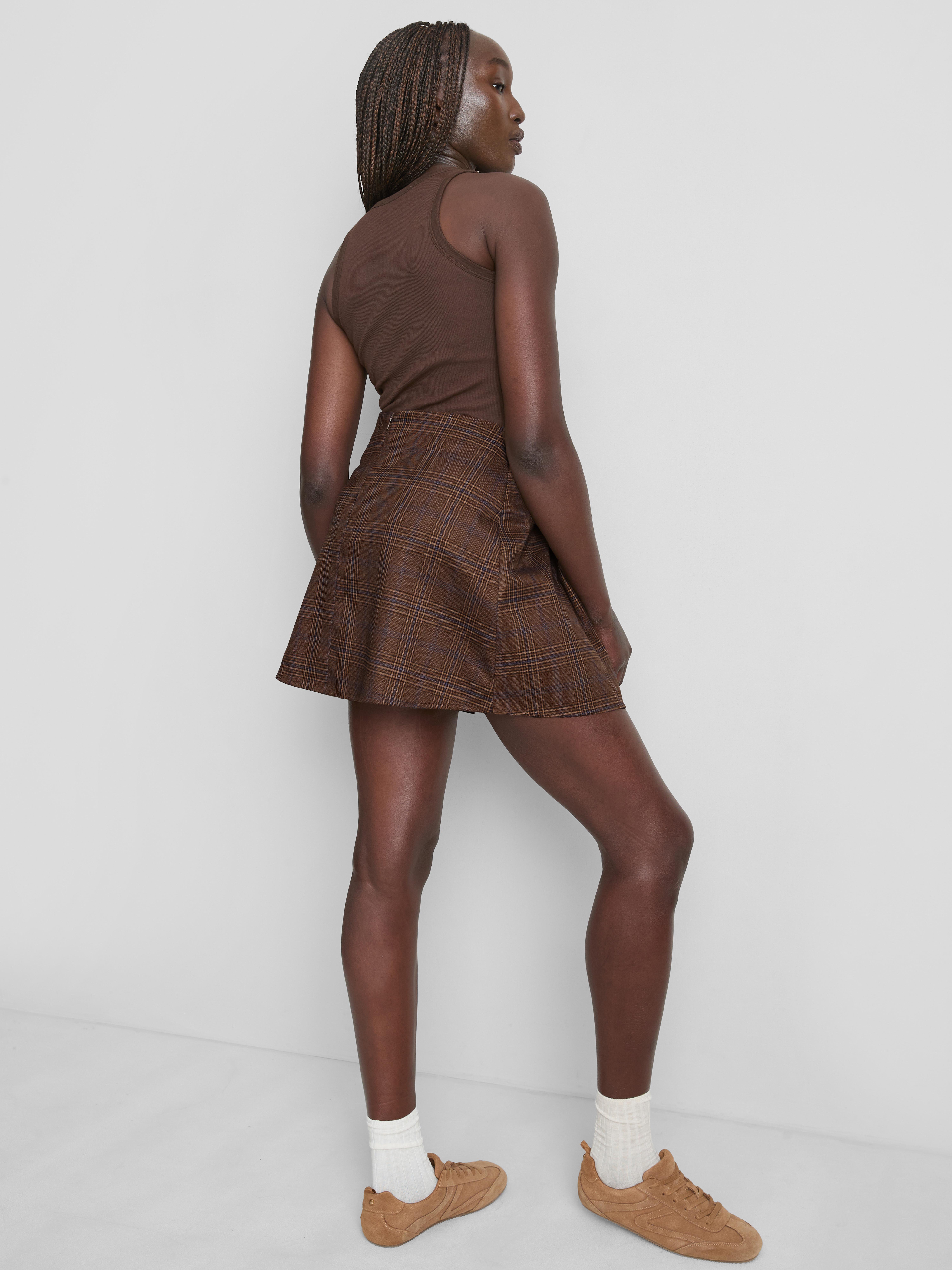 Mini-jupe asymétrique ajustée
