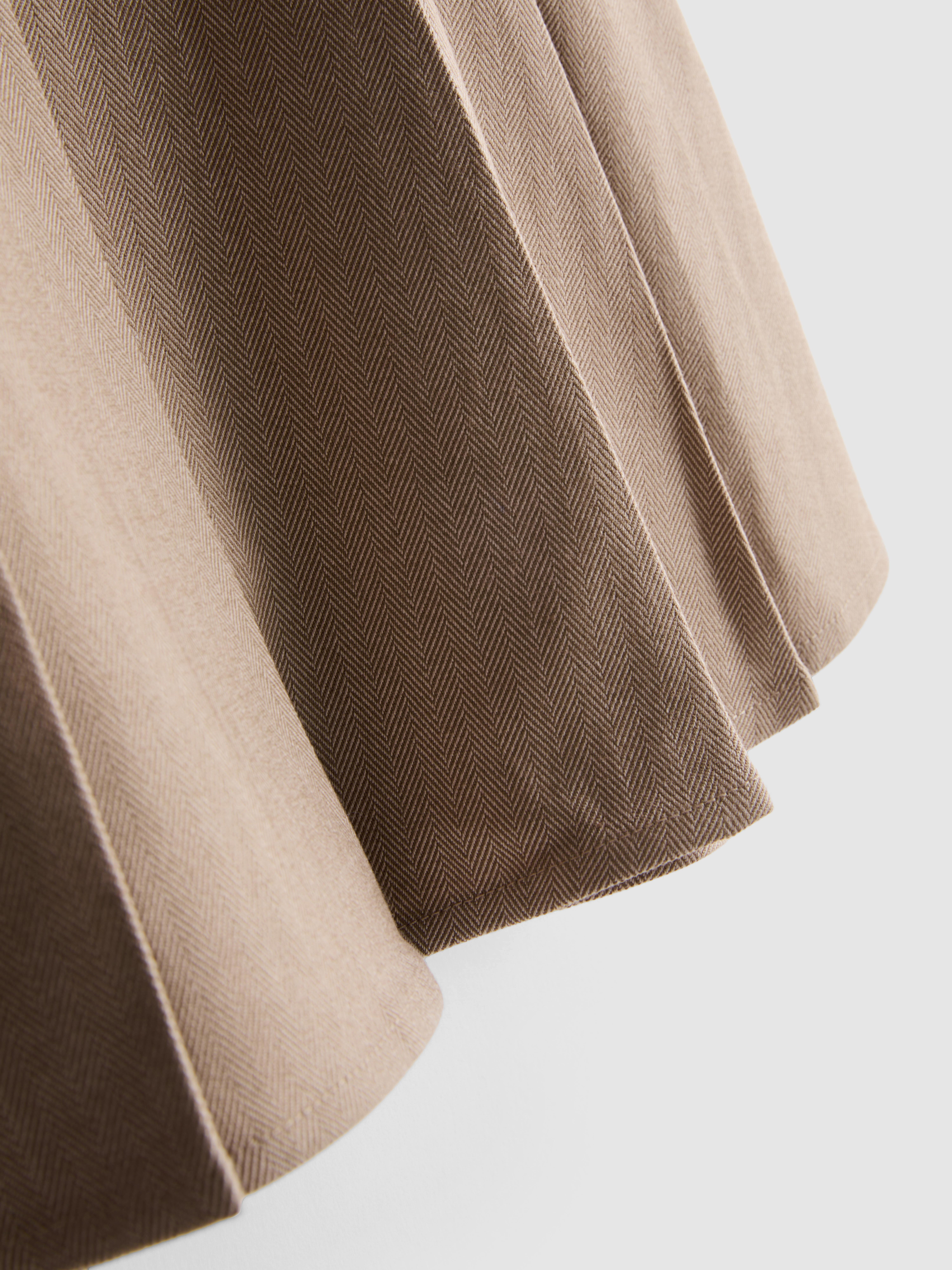 Pleated Belted Mini Skirt