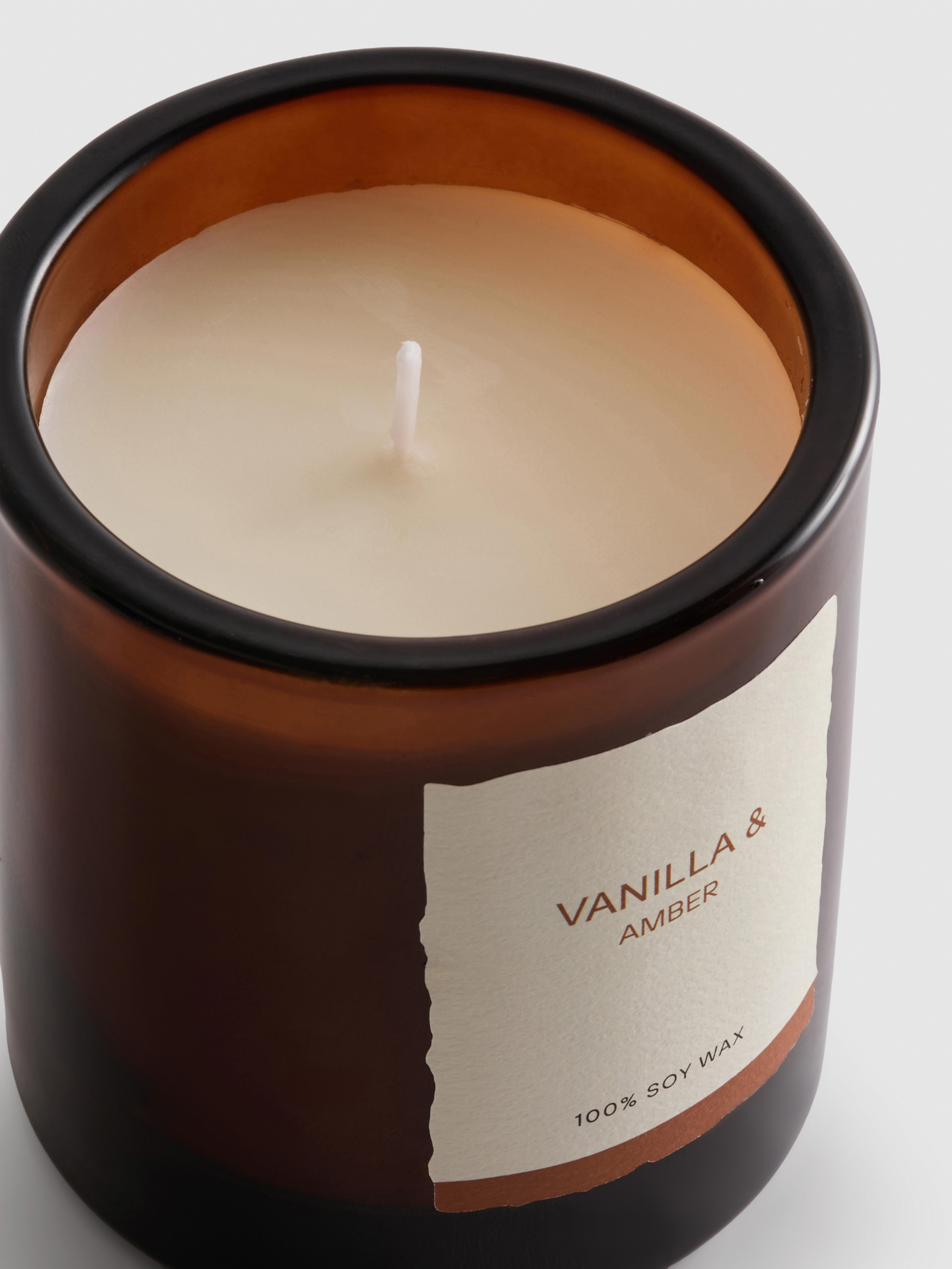 Bougie parfumée dans un pot en verre
