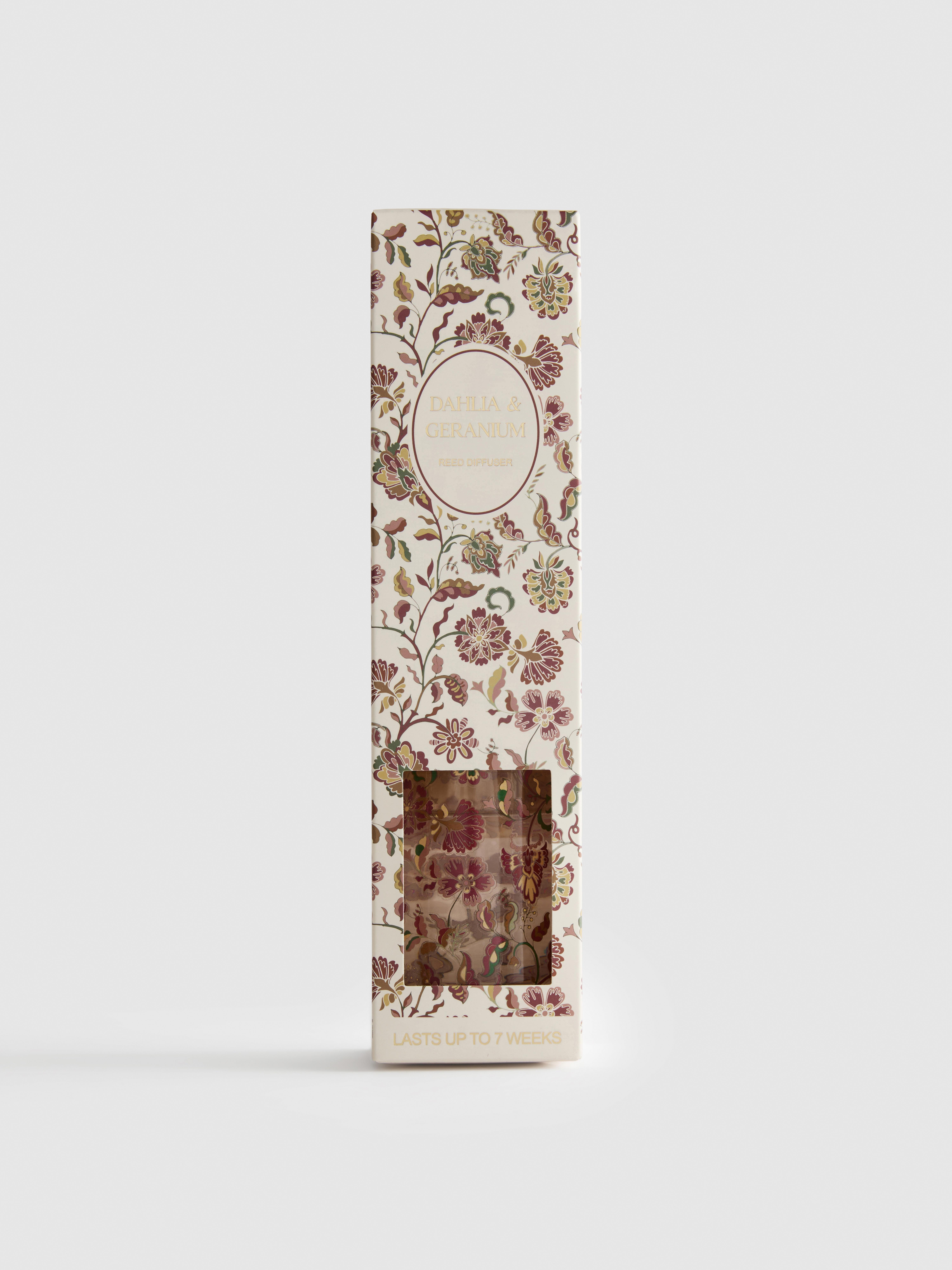 Raumduftstäbchen in Flasche mit Blumenmuster