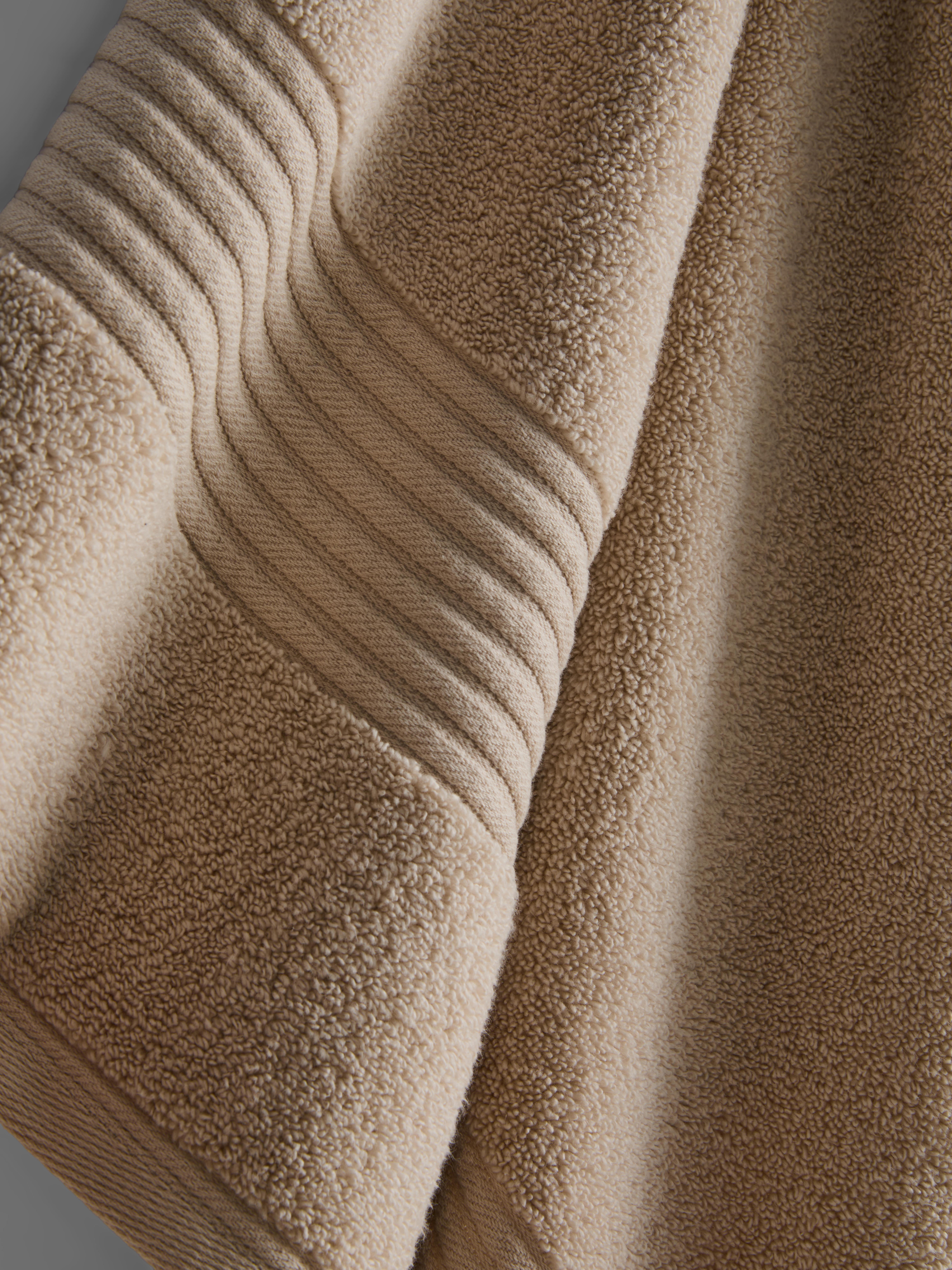 Serviette de bain à bord côtelé