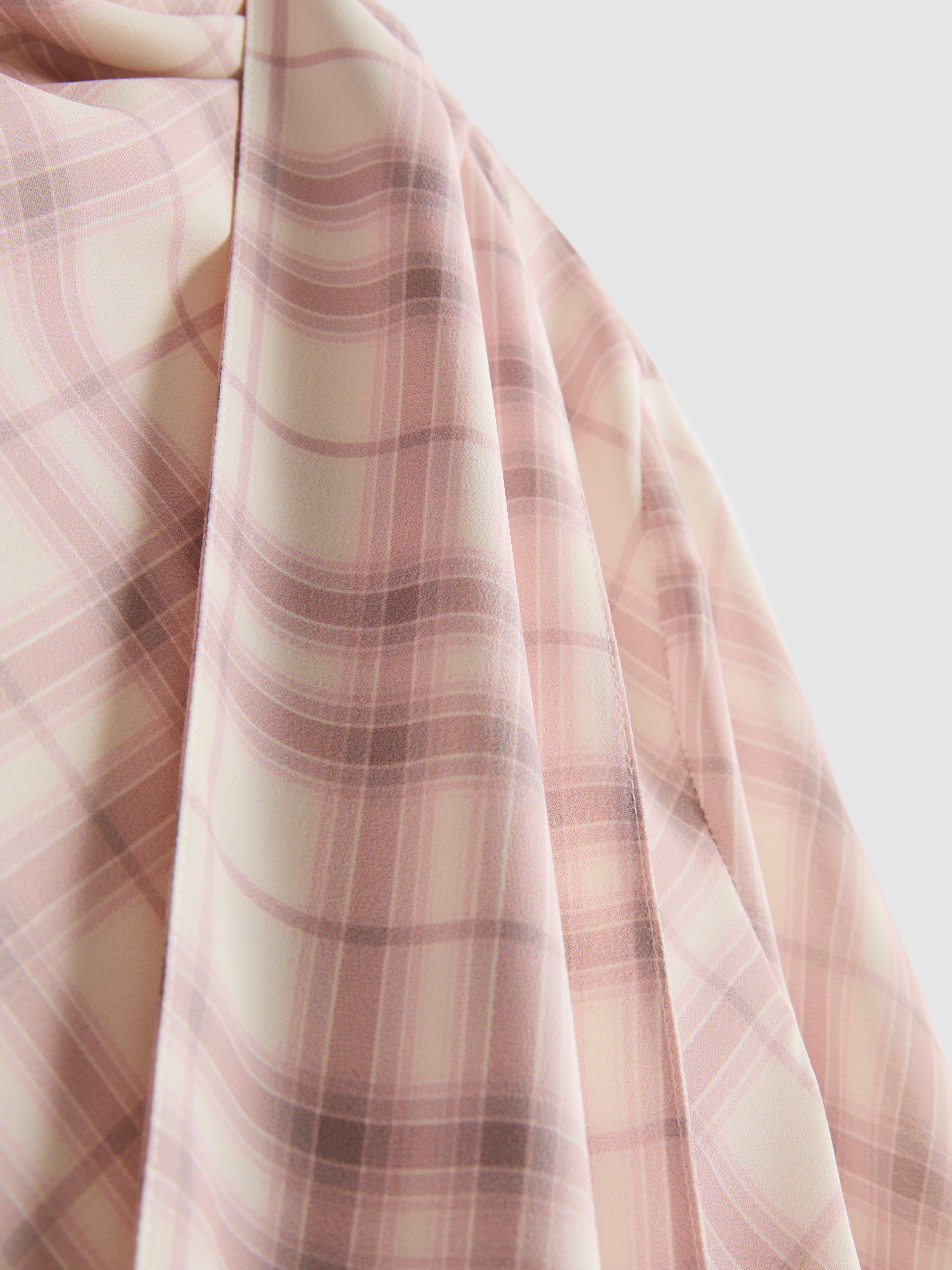 Blusa de cuadros con detalle drapeado