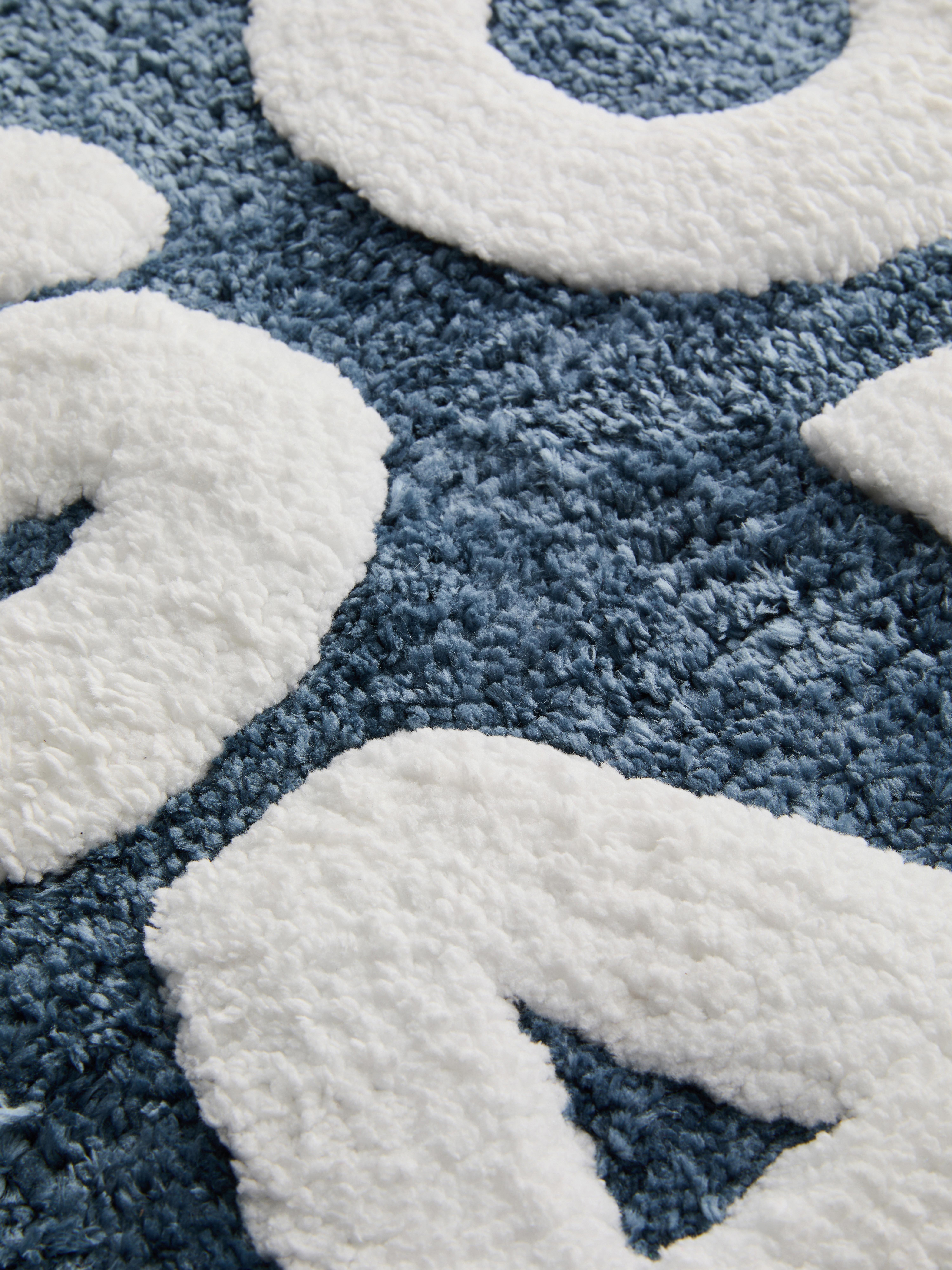 Badematte mit „Soak“ Schriftzug