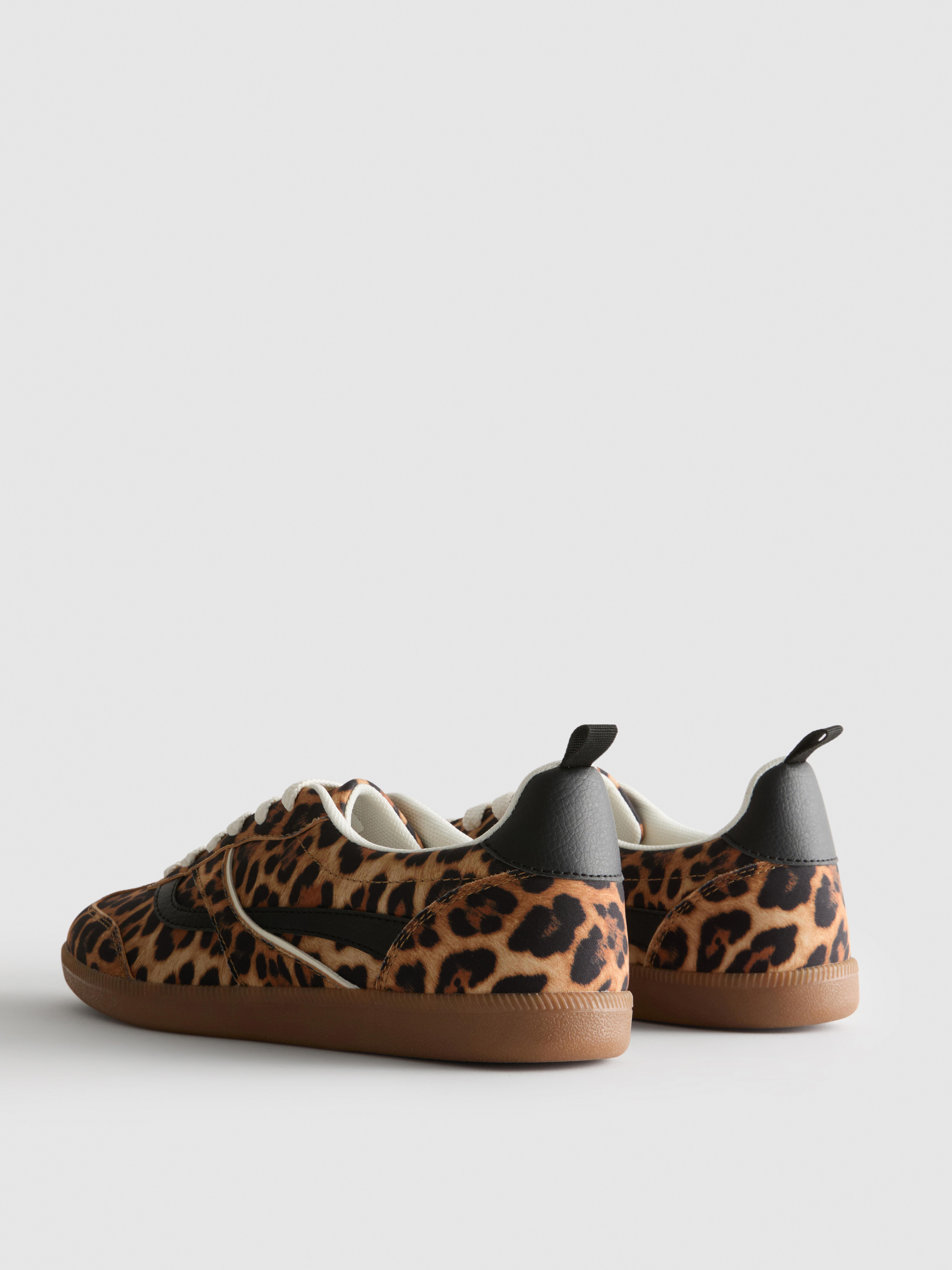 Leopard Low Top Gum Sole Sneakers