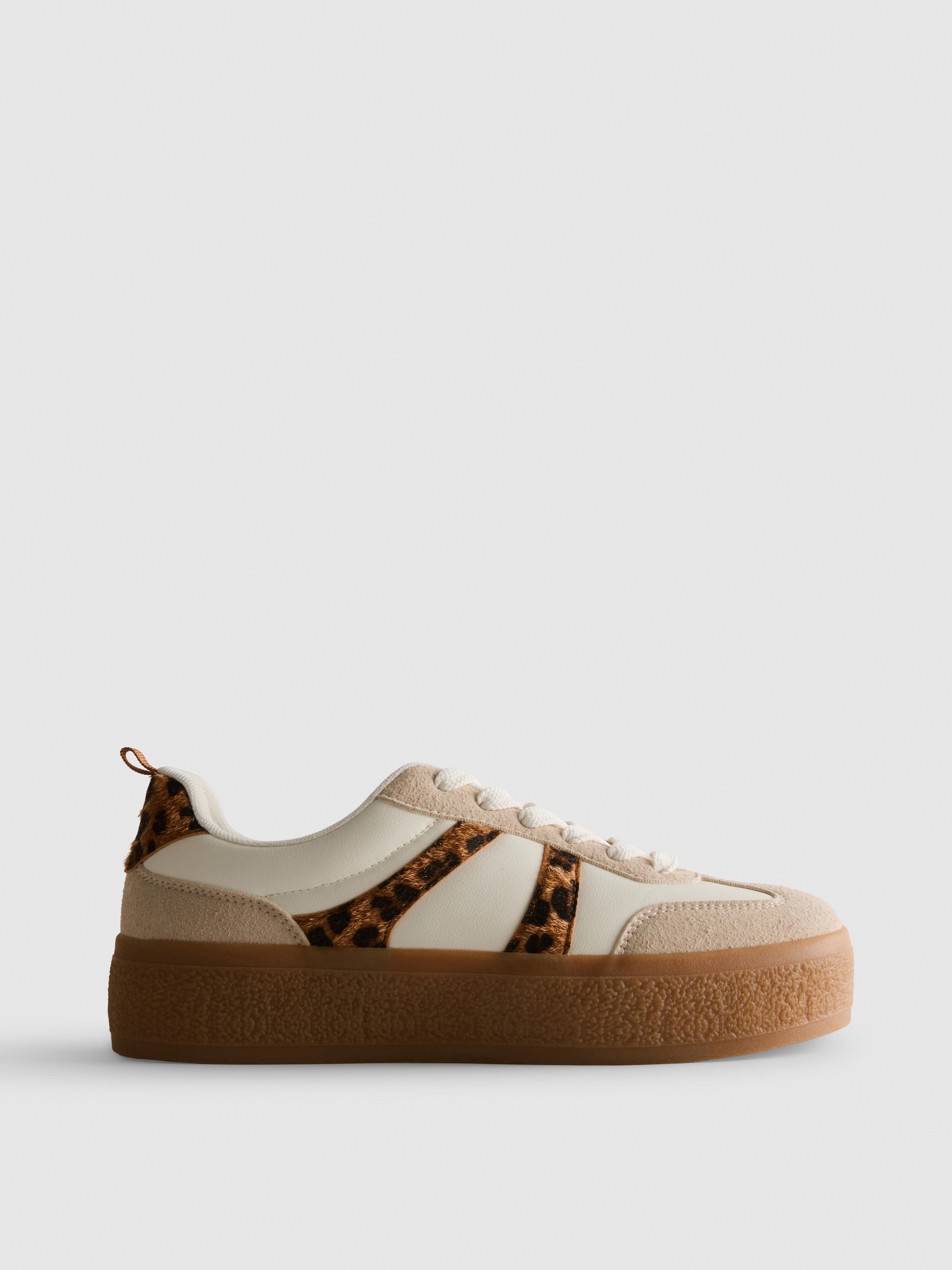 Platformsneakers met gomzolen en luipaardprint