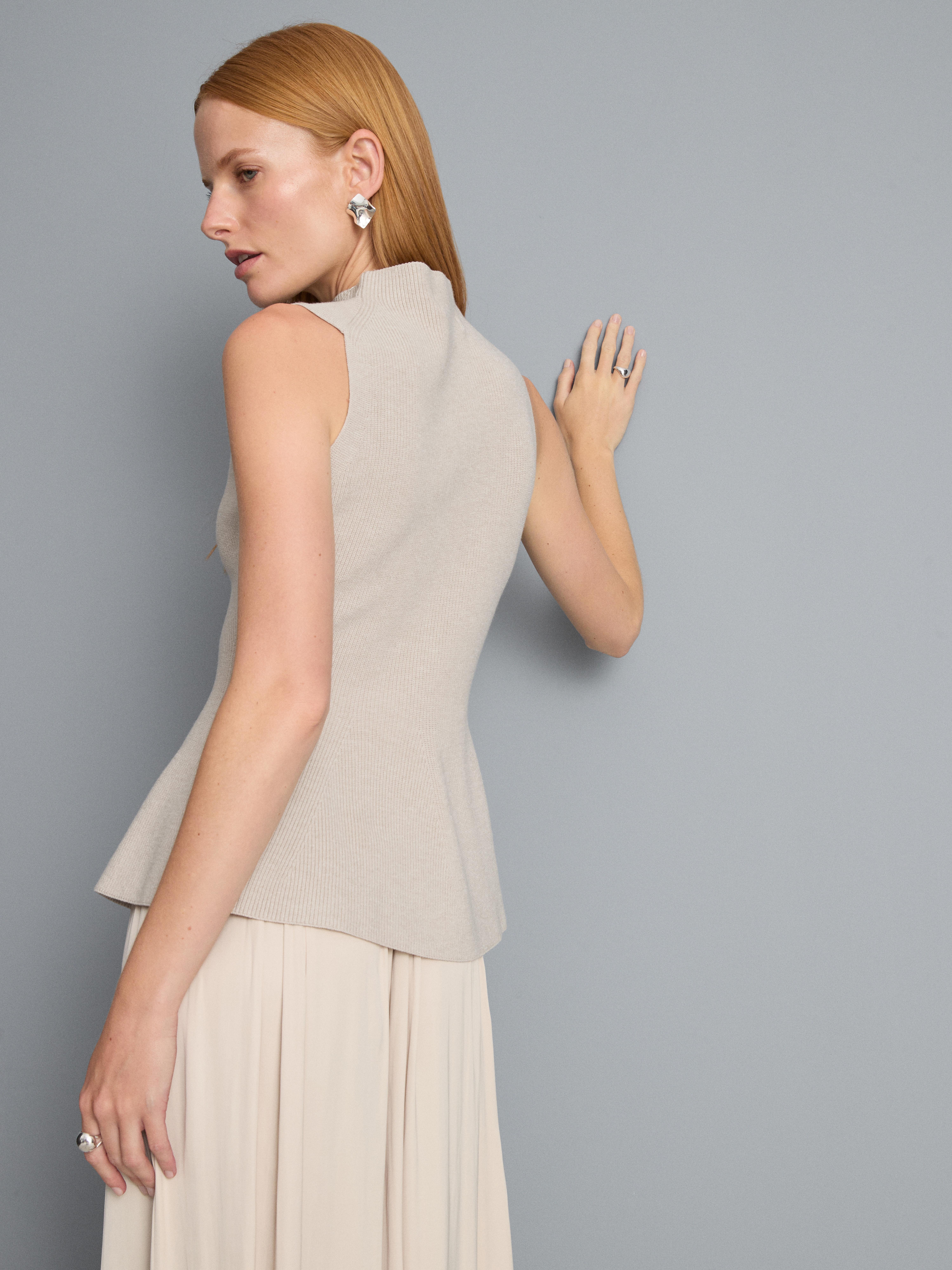 Camiseta sin mangas de punto con péplum