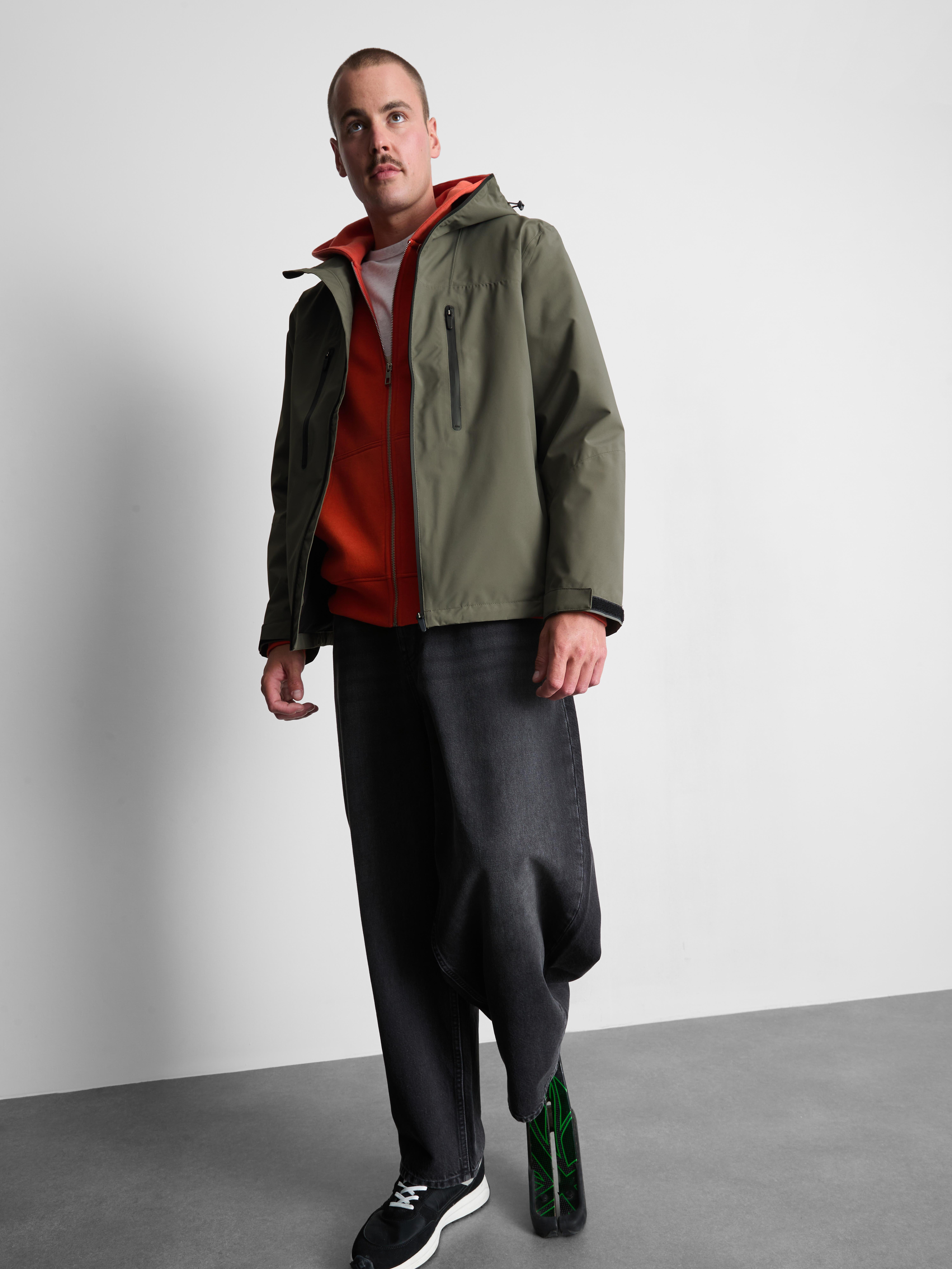 Impermeabile con cappuccio e zip