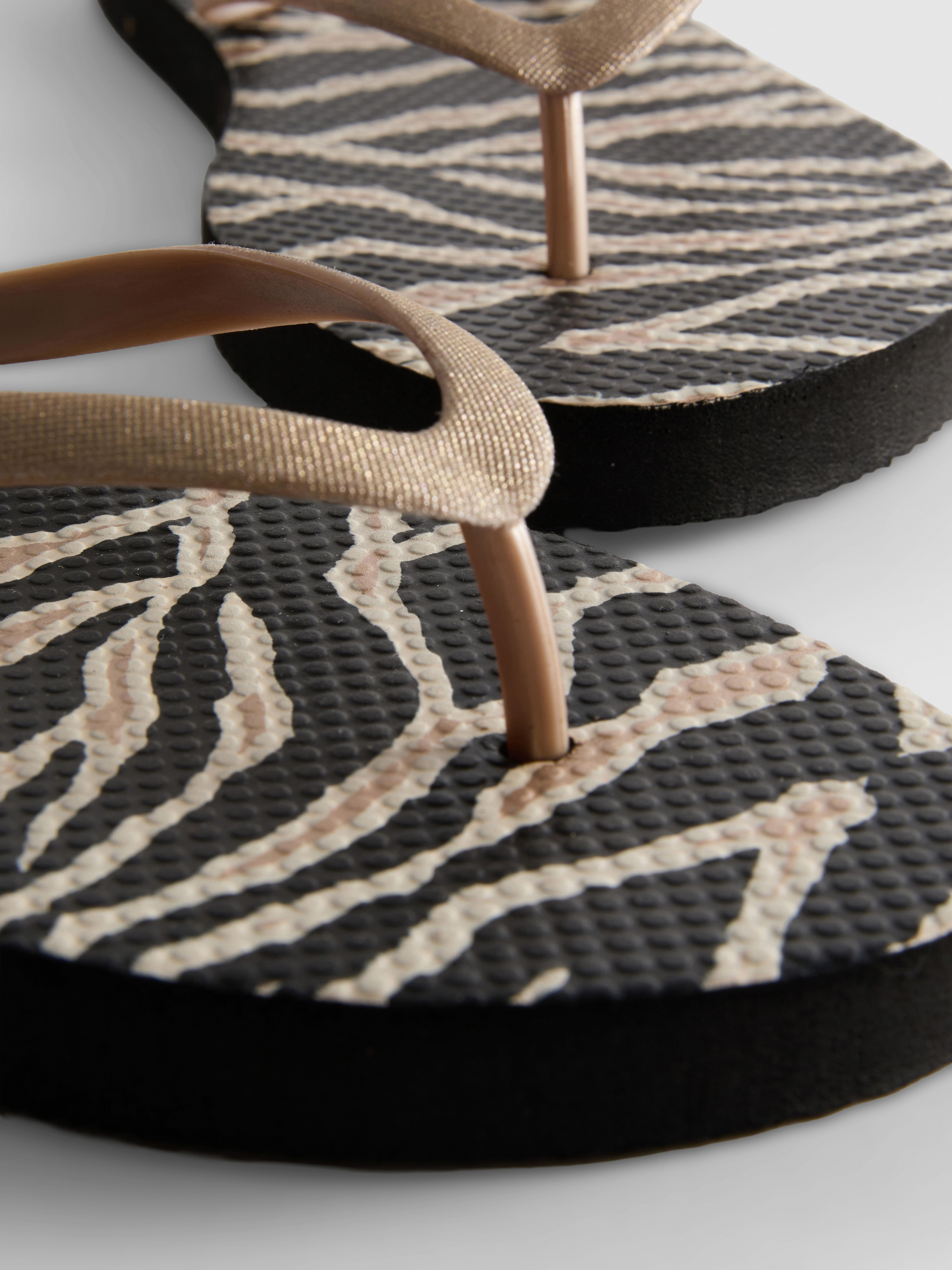 Zebra Print Flip Flops
