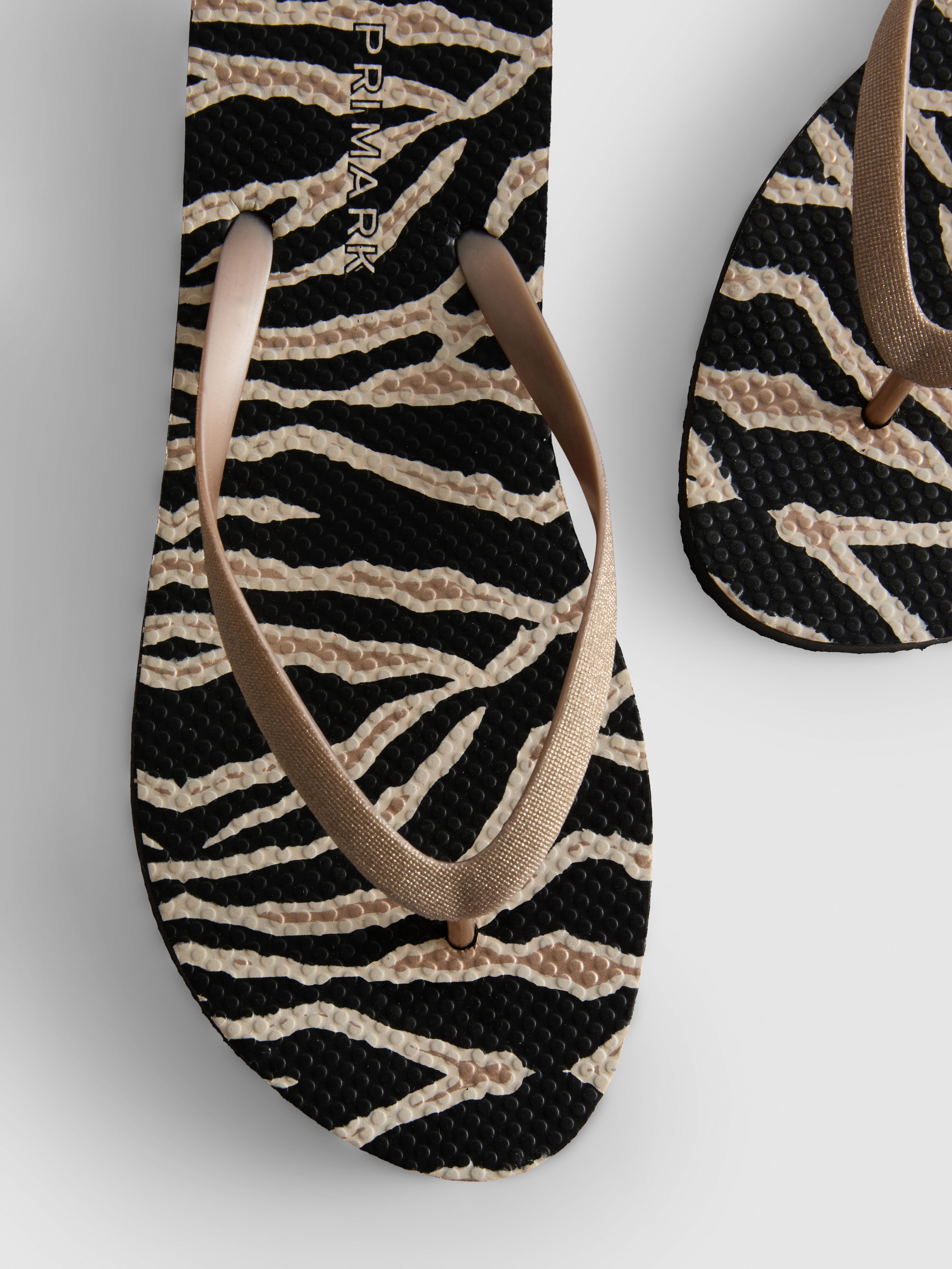 Zebra Print Flip Flops