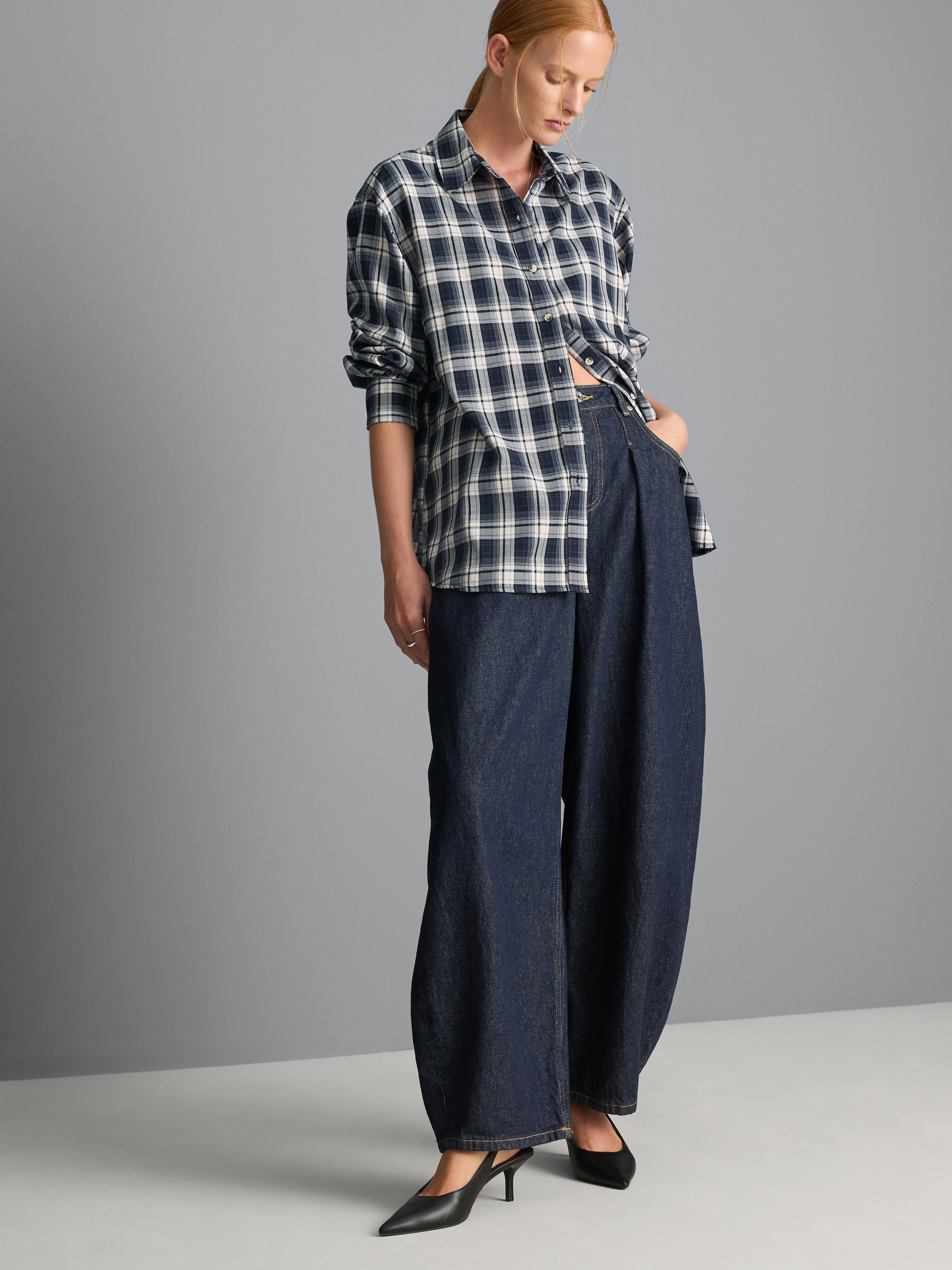 Chemise à carreaux et manches longues