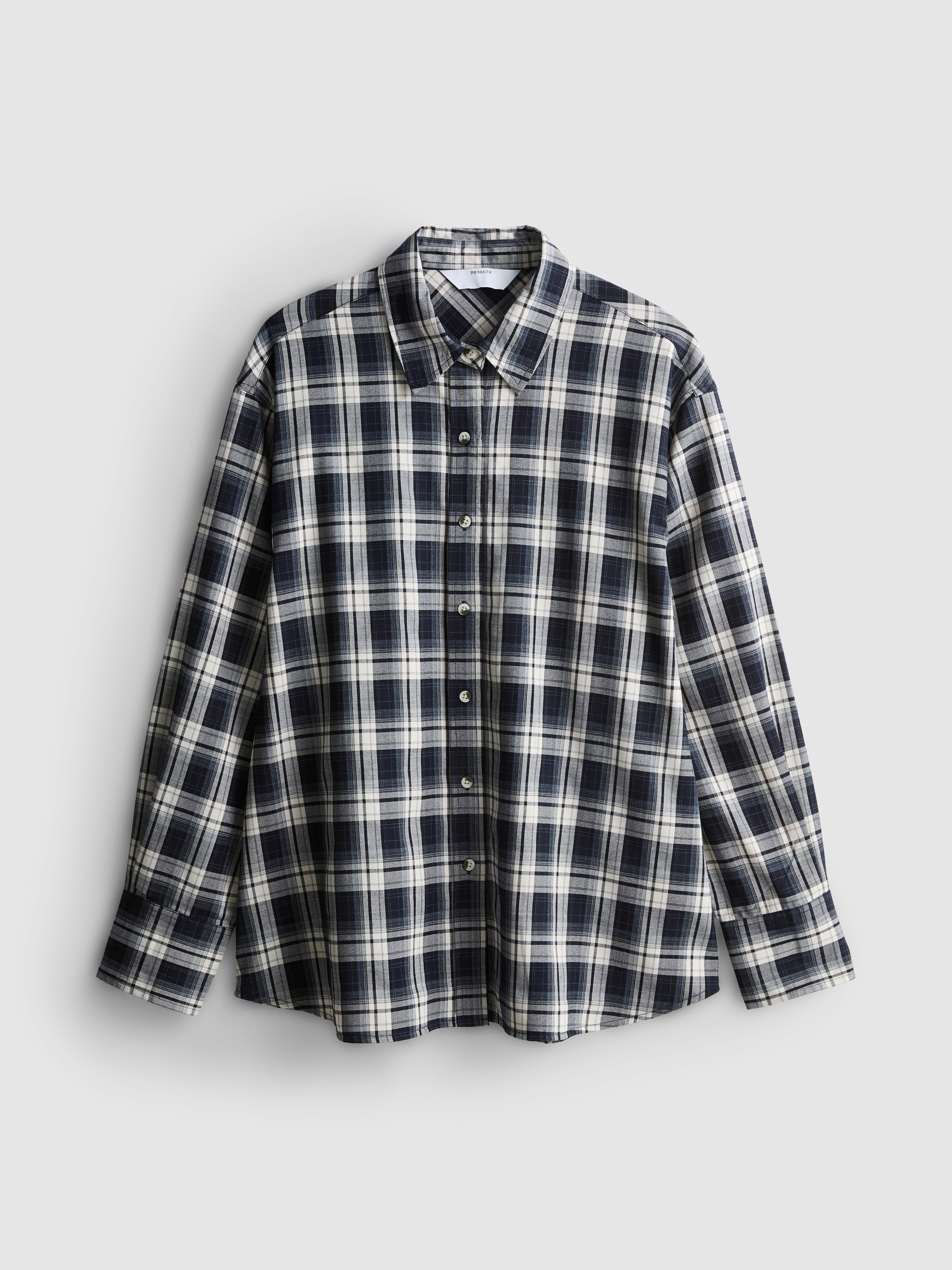 Chemise à carreaux et manches longues