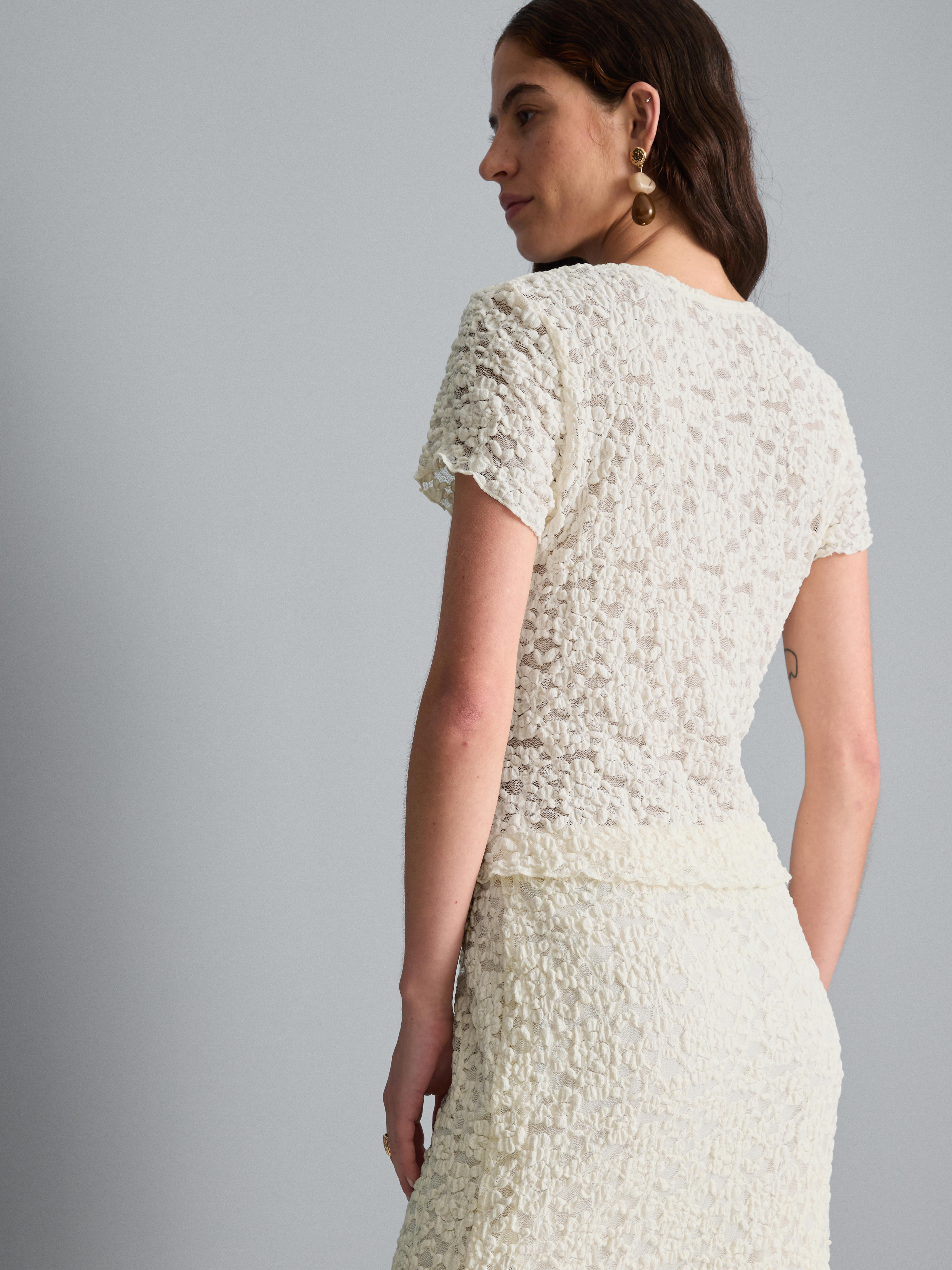 Asymmetrische top van katoenmix met kant en textuur