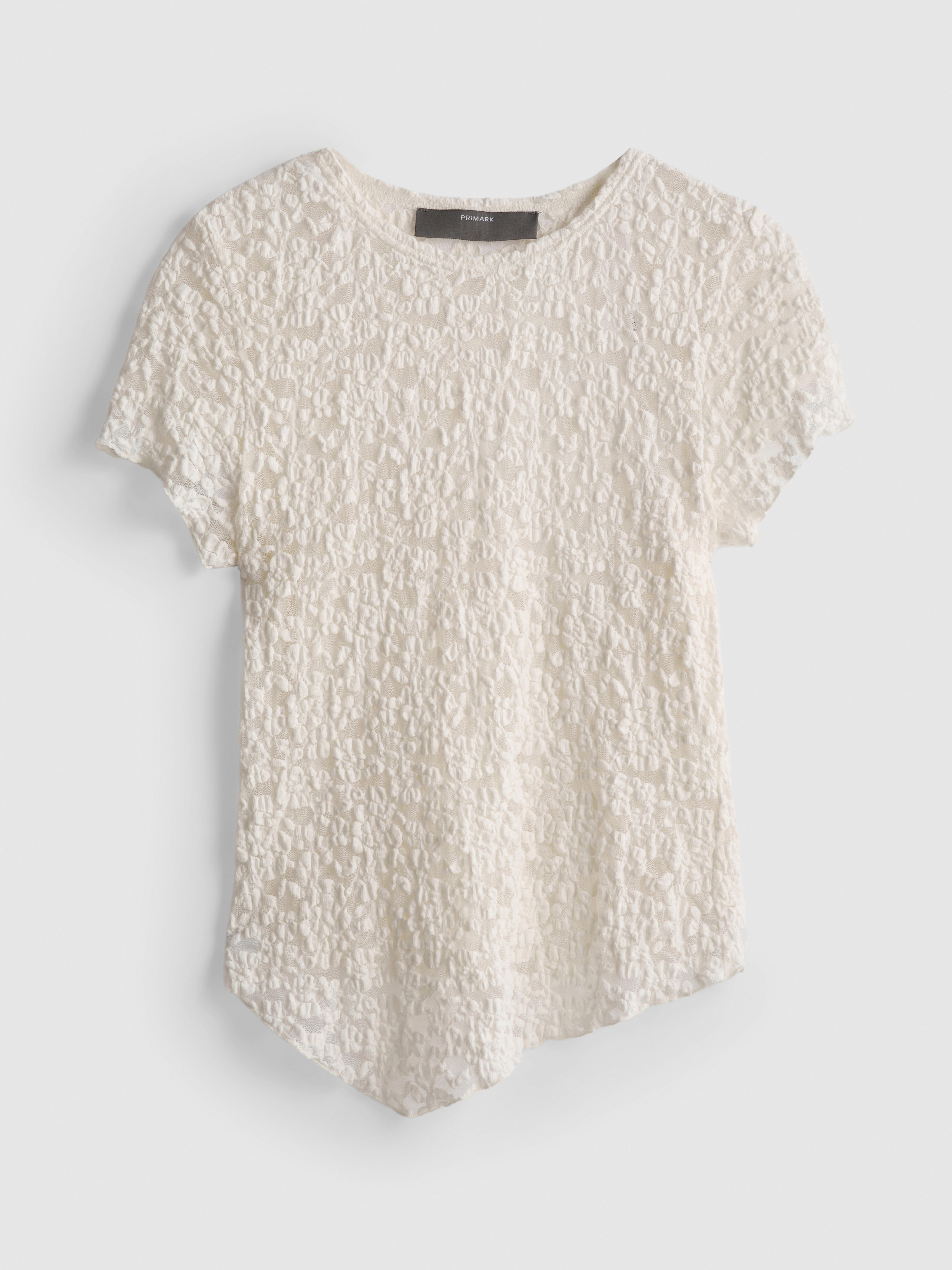 Asymmetrische top van katoenmix met kant en textuur