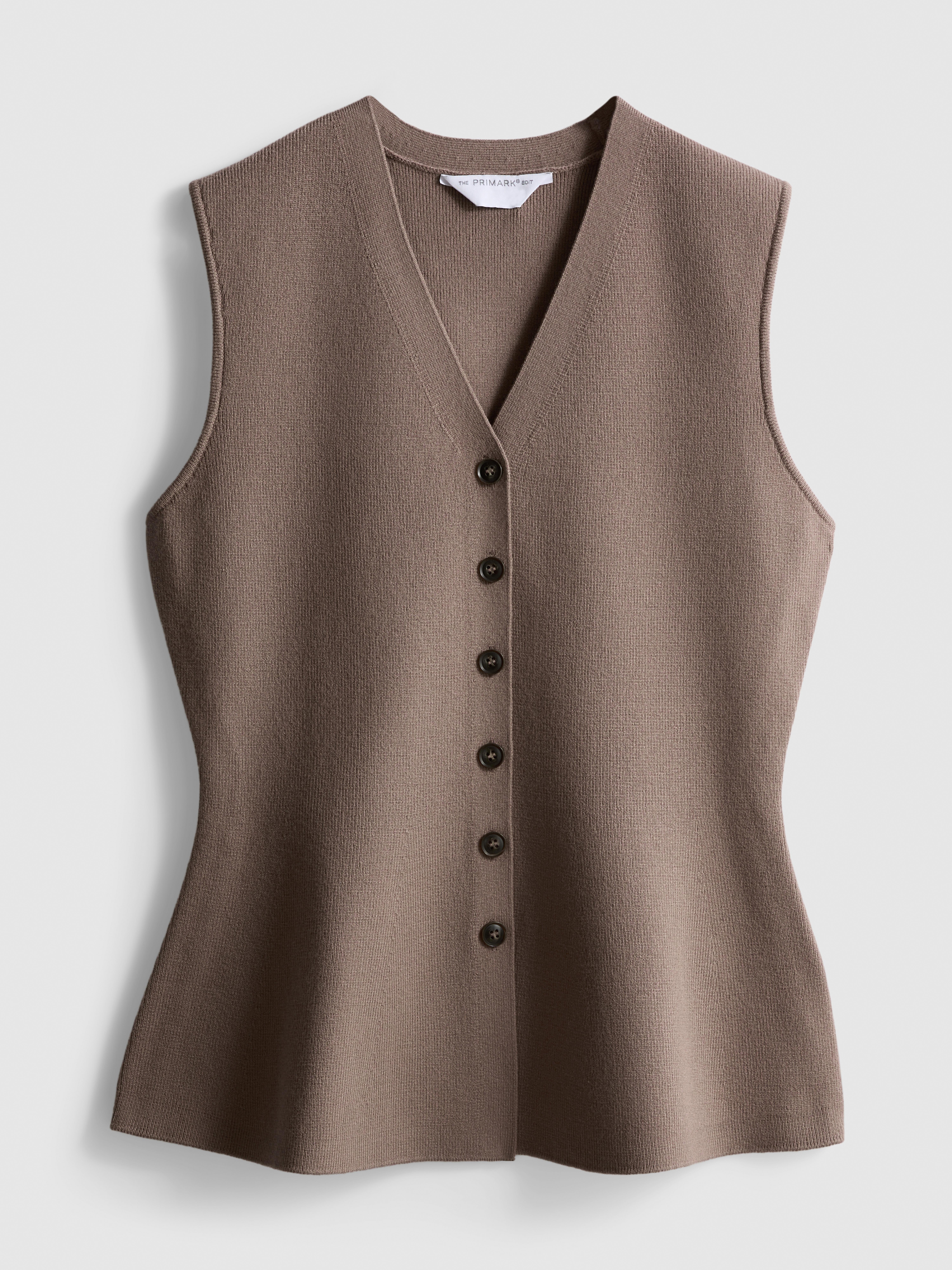 Gebreid mouwloos peplum-gilet The Edit