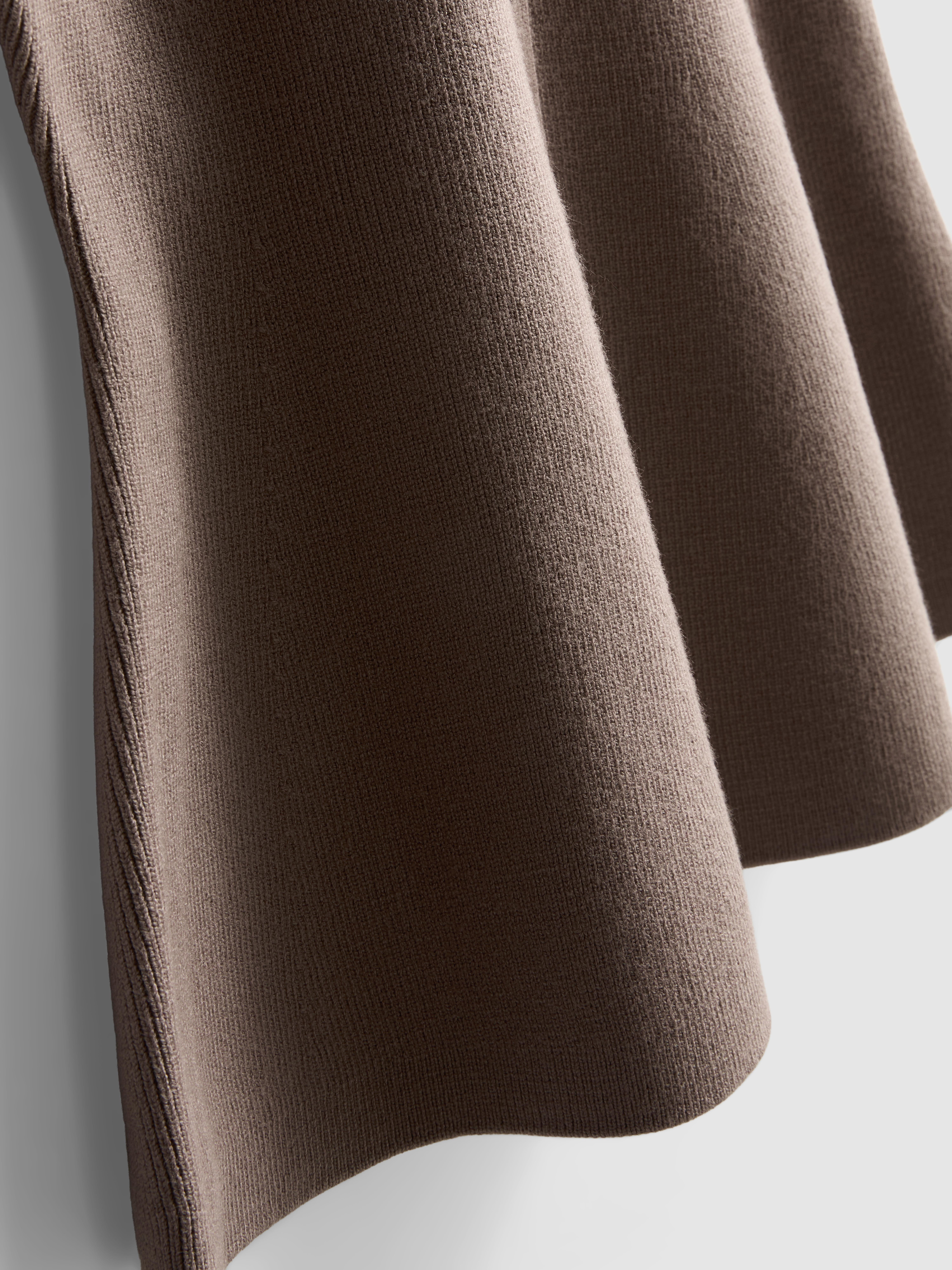 Gebreid mouwloos peplum-gilet The Edit