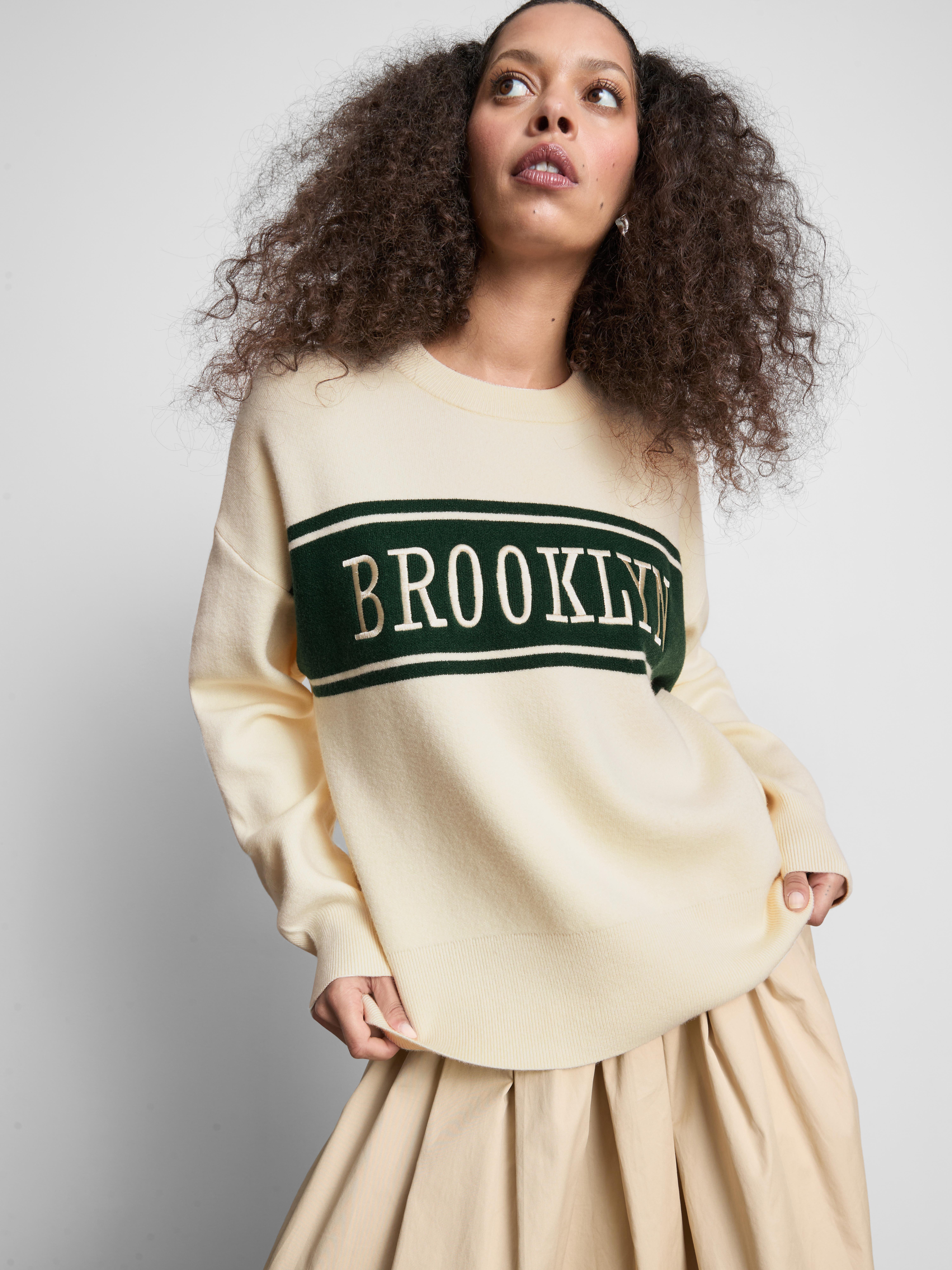 Maglione girocollo con scritta Avorio