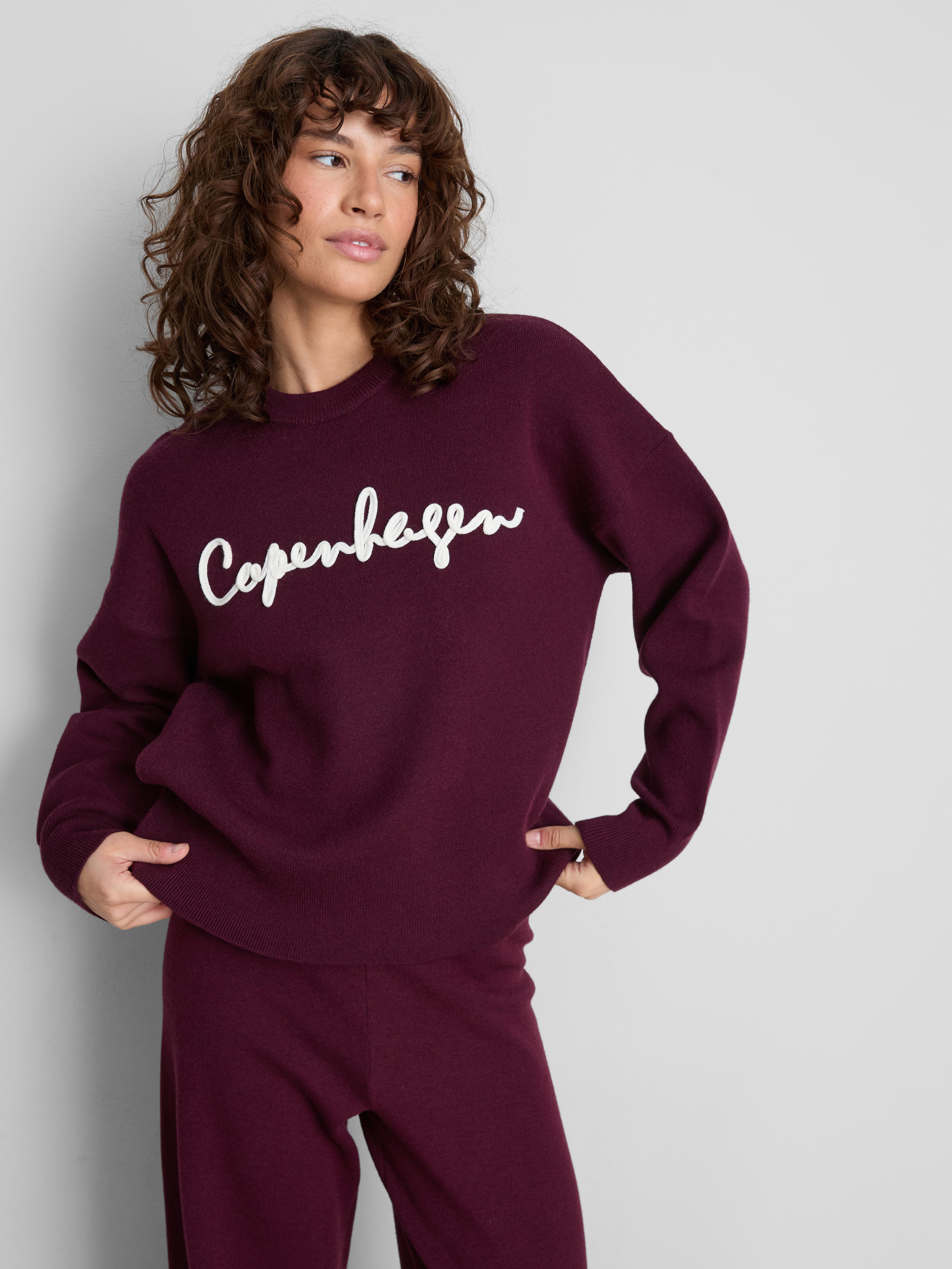 Maglione girocollo con scritta