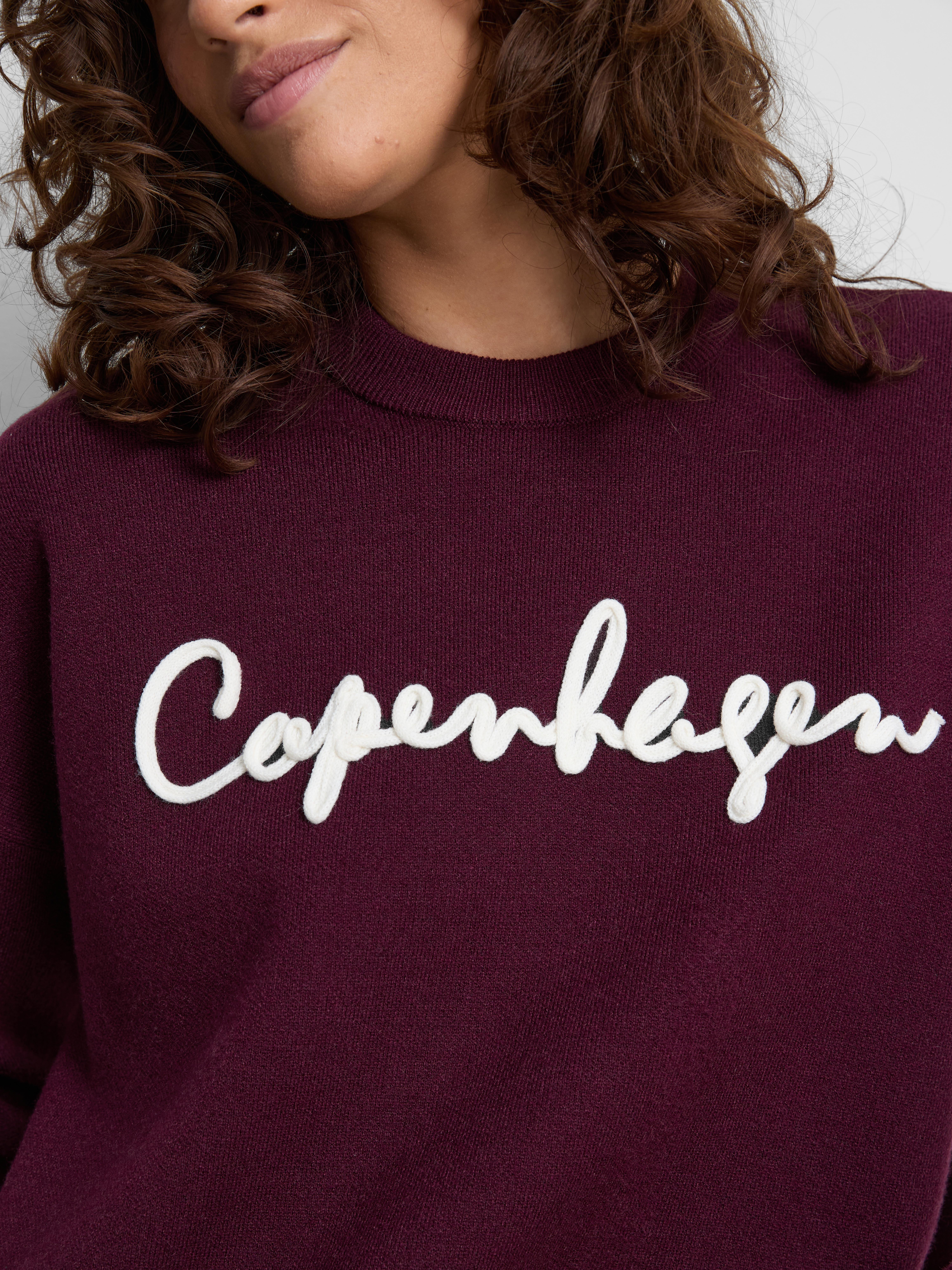Maglione girocollo con scritta