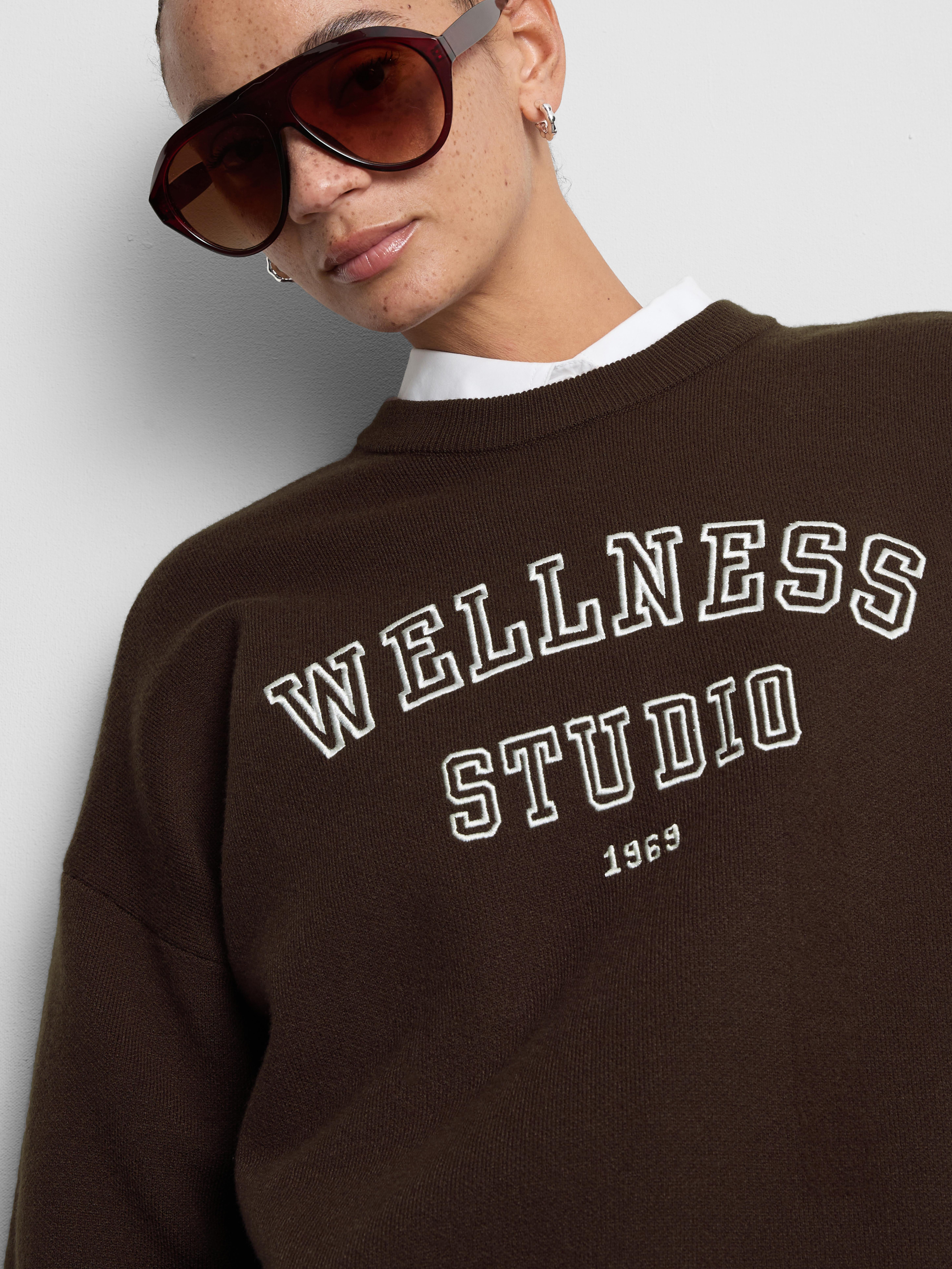 Maglione girocollo con scritta