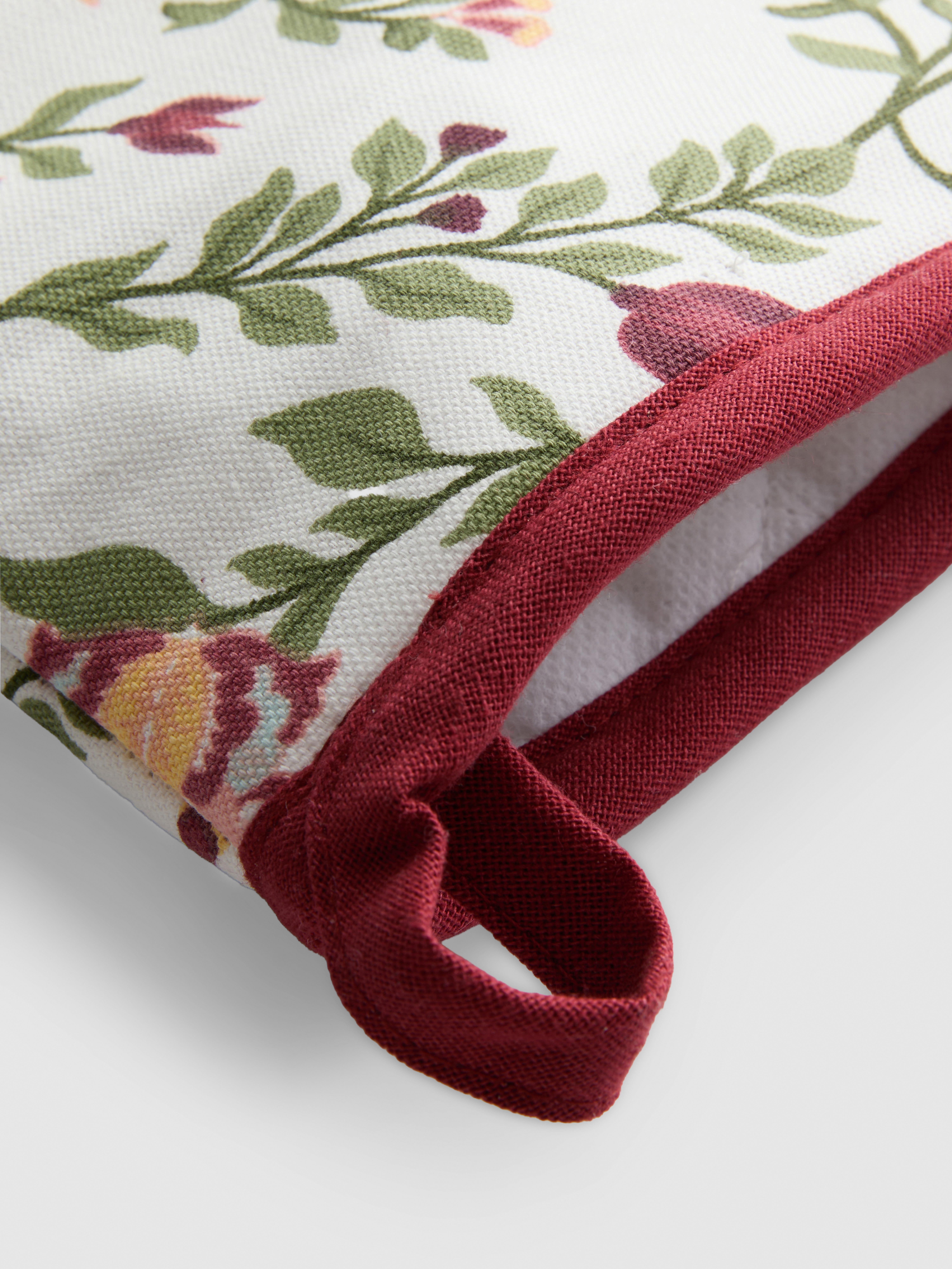 Manique à motif floral