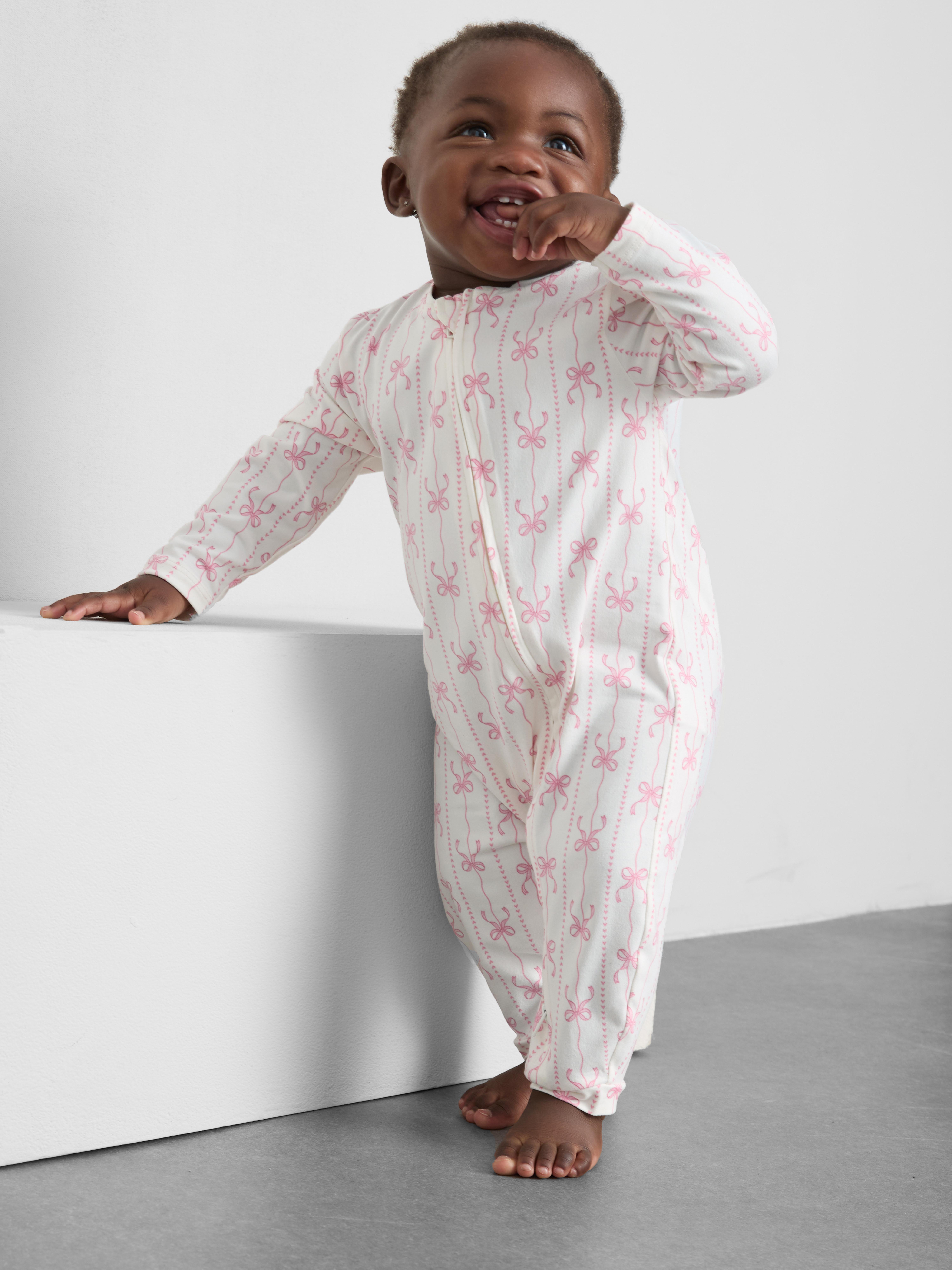 0-24mths | Bow Print Zip-Up Sleepsuit