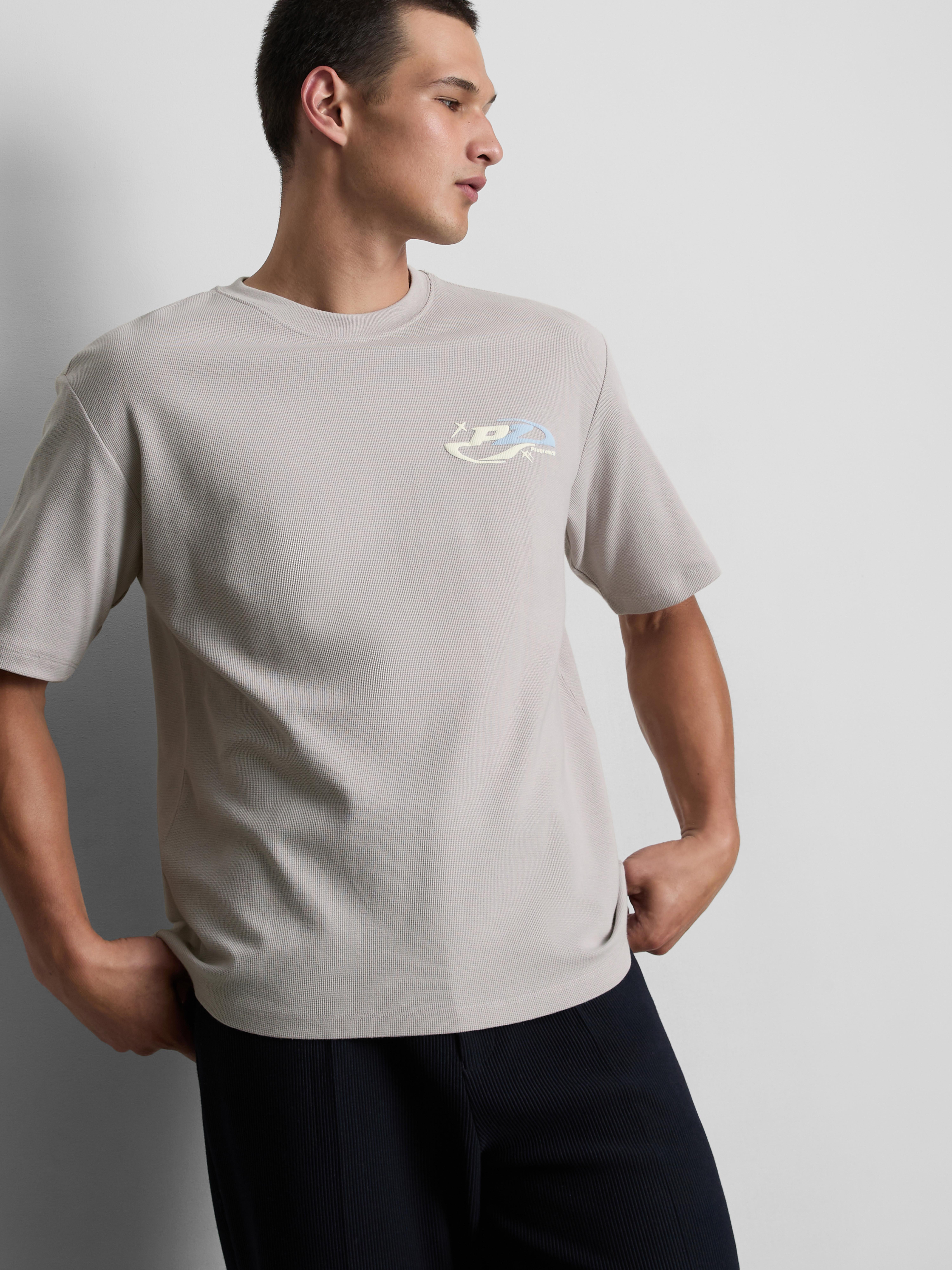 T-shirt texturada gráfico logótipo